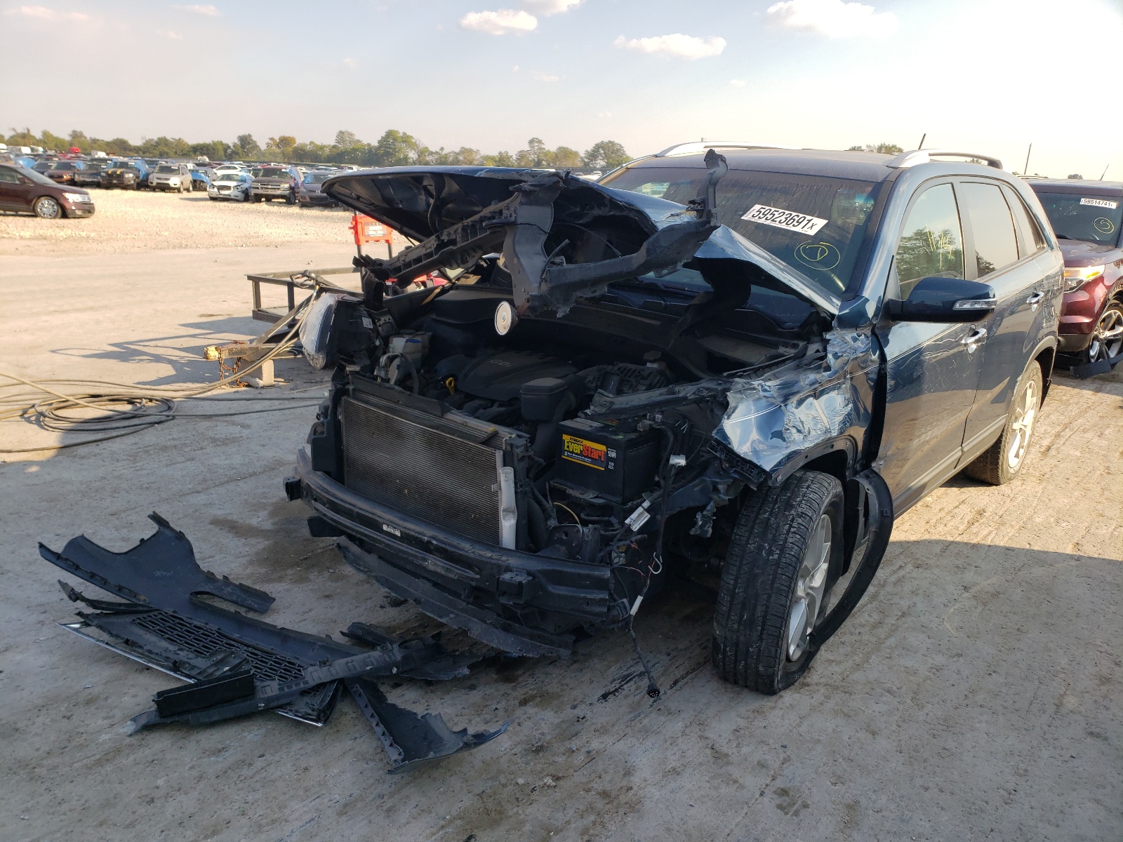 Photo 2 from auction – 2014 KIA SORENTO LX with VIN 5XYKT4A61EG459310