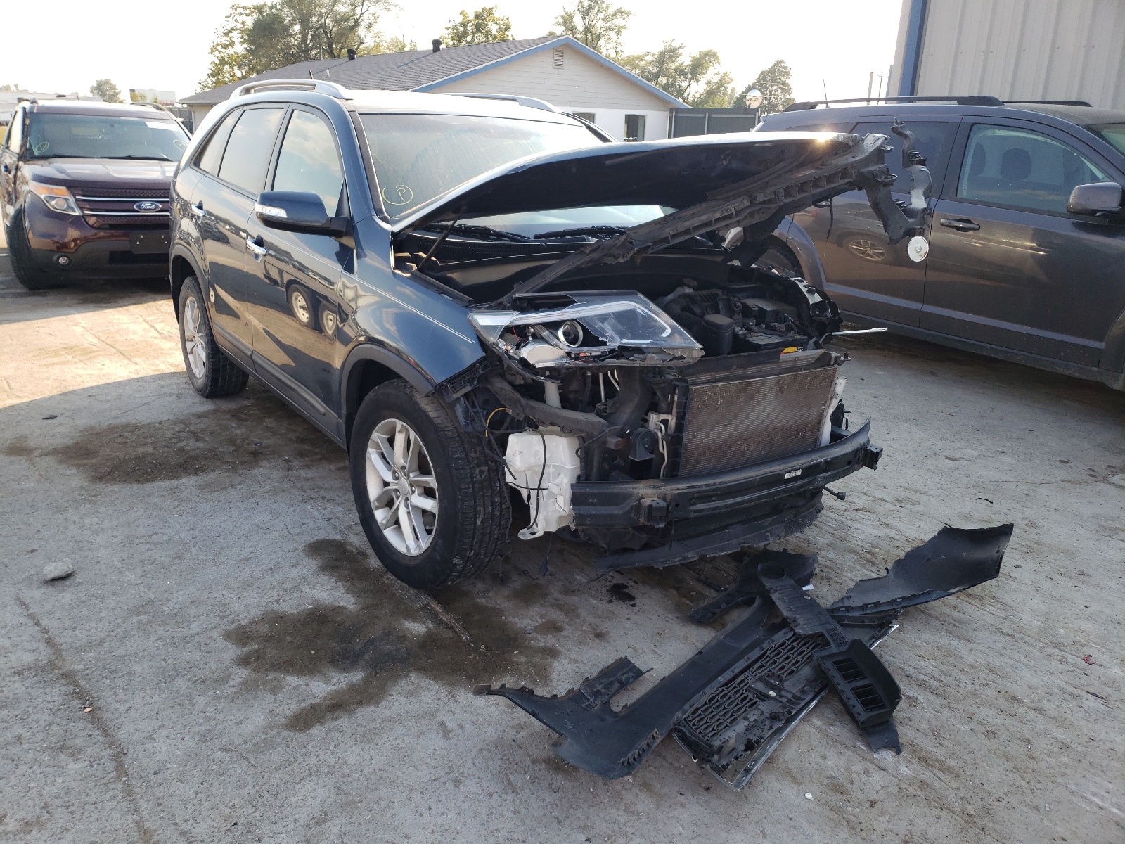 Photo 1 from auction – 2014 KIA SORENTO LX with VIN 5XYKT4A61EG459310