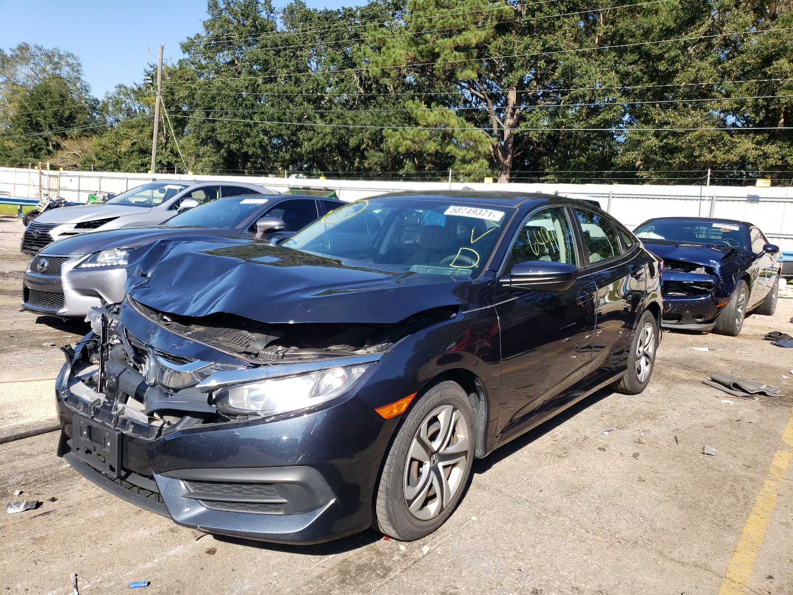 Photo 2 from auction – 2017 HONDA CIVIC LX with VIN 2HGFC2F52HH509533