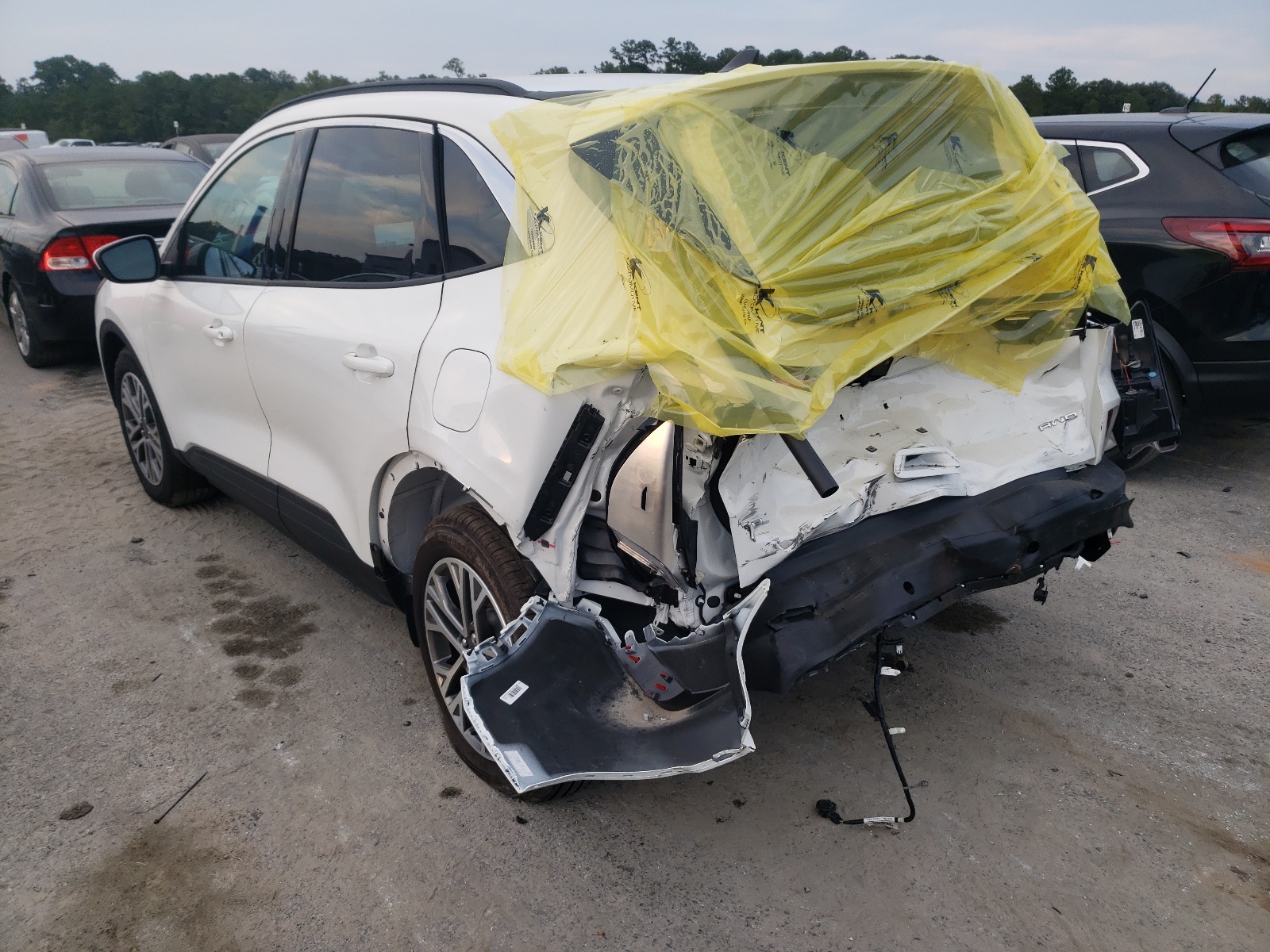 Photo 3 from auction – 2021 FORD ESCAPE SEL with VIN 1FMCU9H91MUA37903