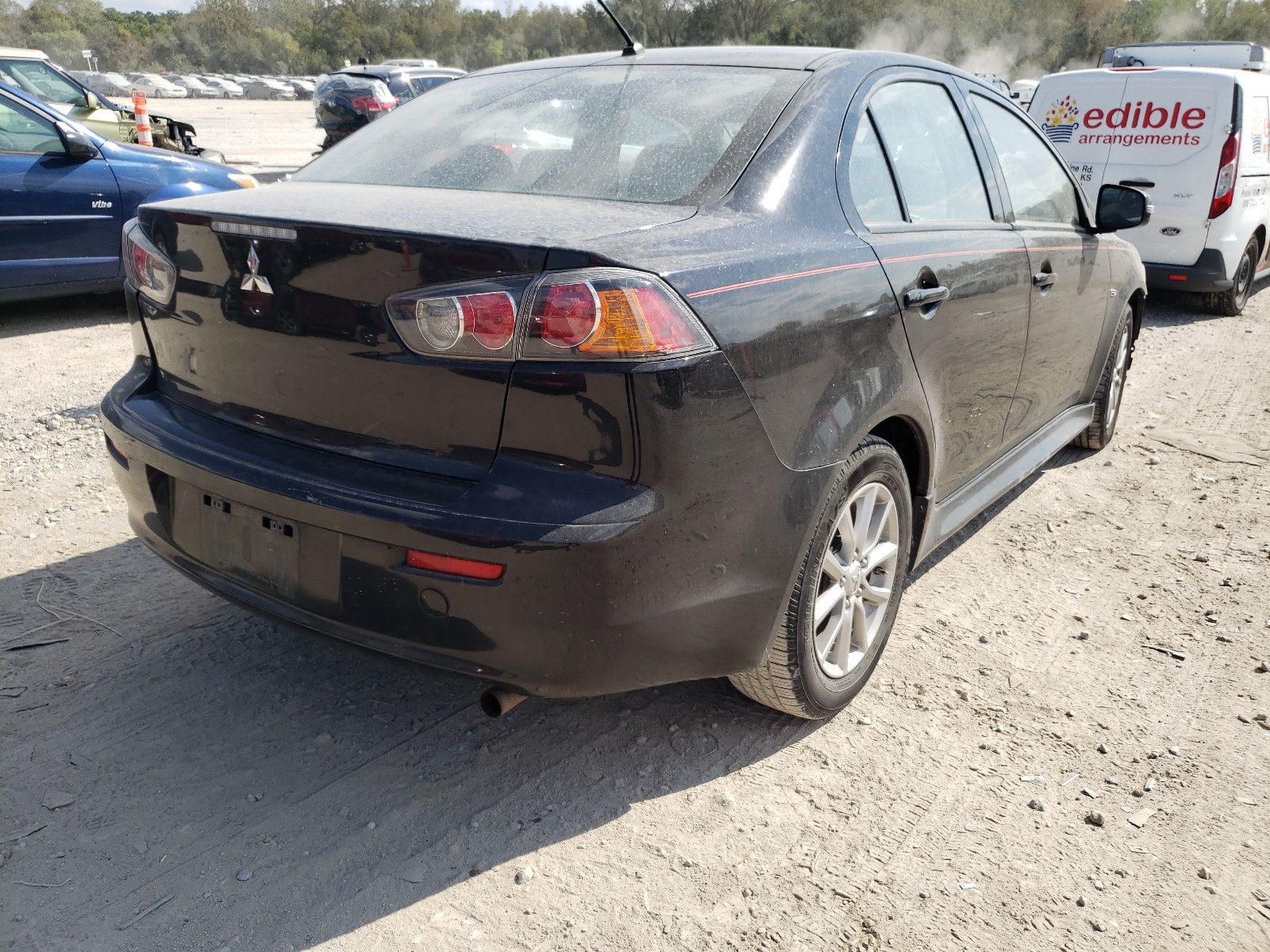 Photo 4 from auction – 2016 MITSUBISHI LANCER ES with VIN JA32U2FU0GU001170