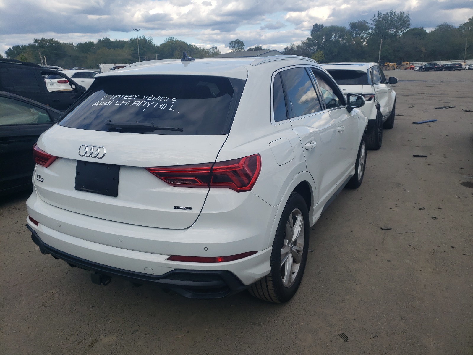 Photo 4 from auction – 2021 AUDI Q3 PREMIUM with VIN WA1DECF38M1011344