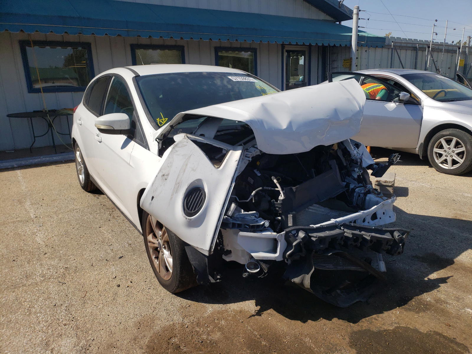 FORD FOCUS SE 2014 with VIN 1FADP3K28EL258419 - Photo from auction