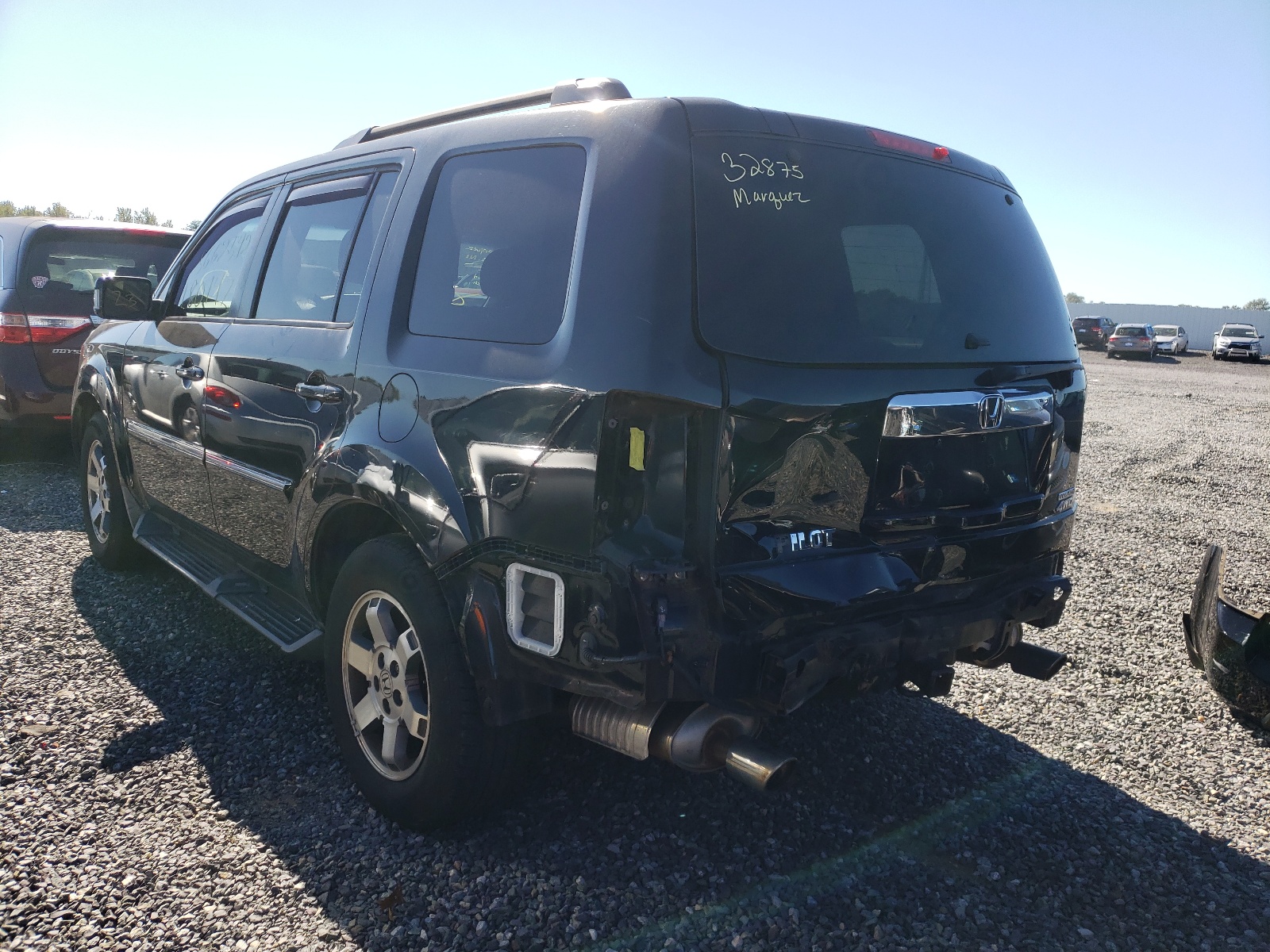 Photo 3 from auction – 2010 HONDA PILOT TOUR with VIN 5FNYF4H81AB012311