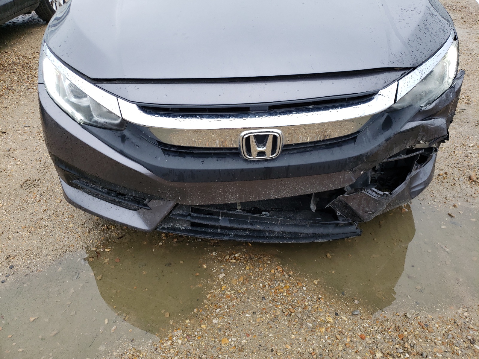 Photo 9 from auction – 2018 HONDA CIVIC EX with VIN 19XFC2F77JE032082