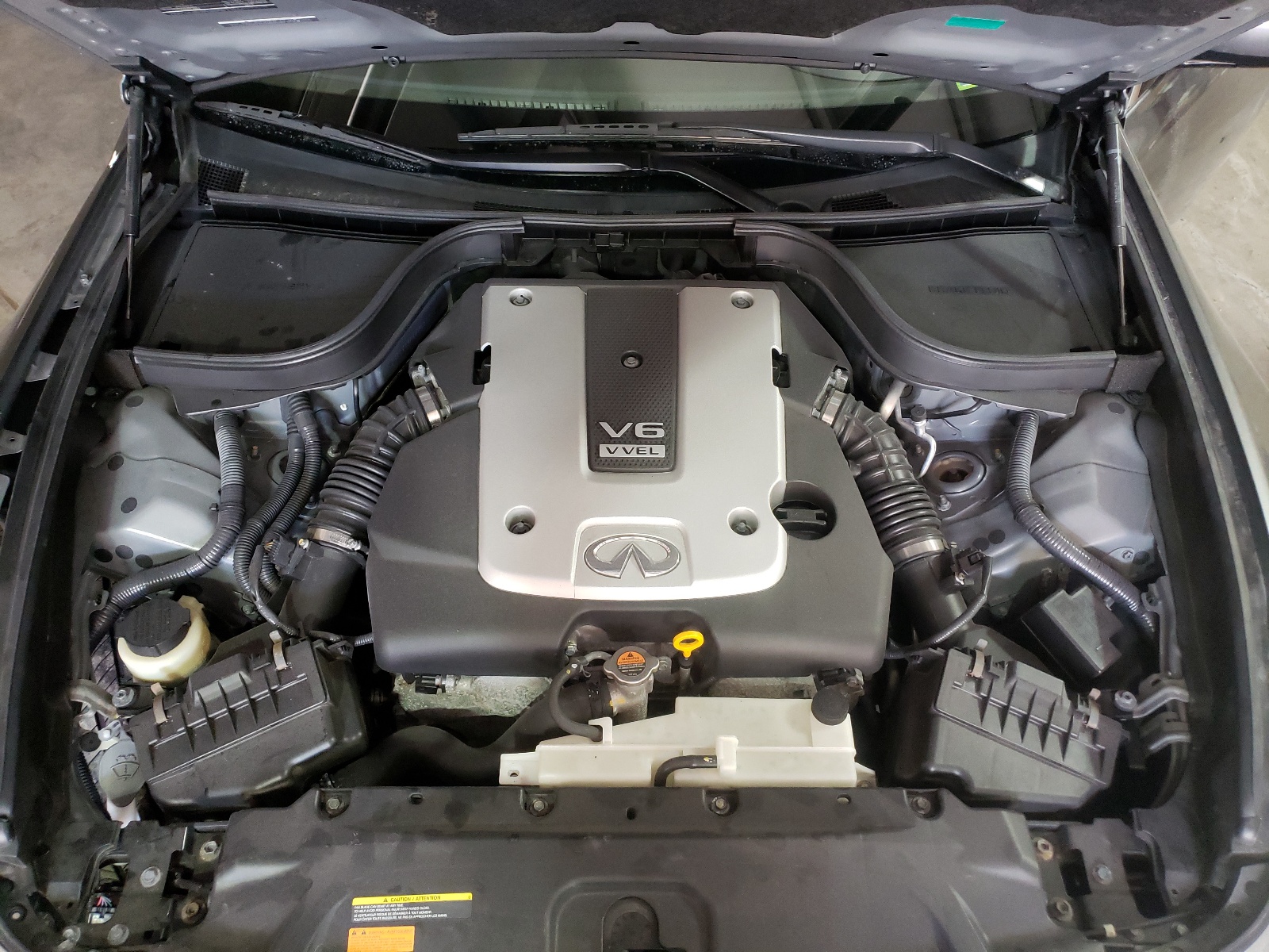 Photo 7 from auction – 2015 INFINITI Q40 with VIN JN1CV6AR6FM650325