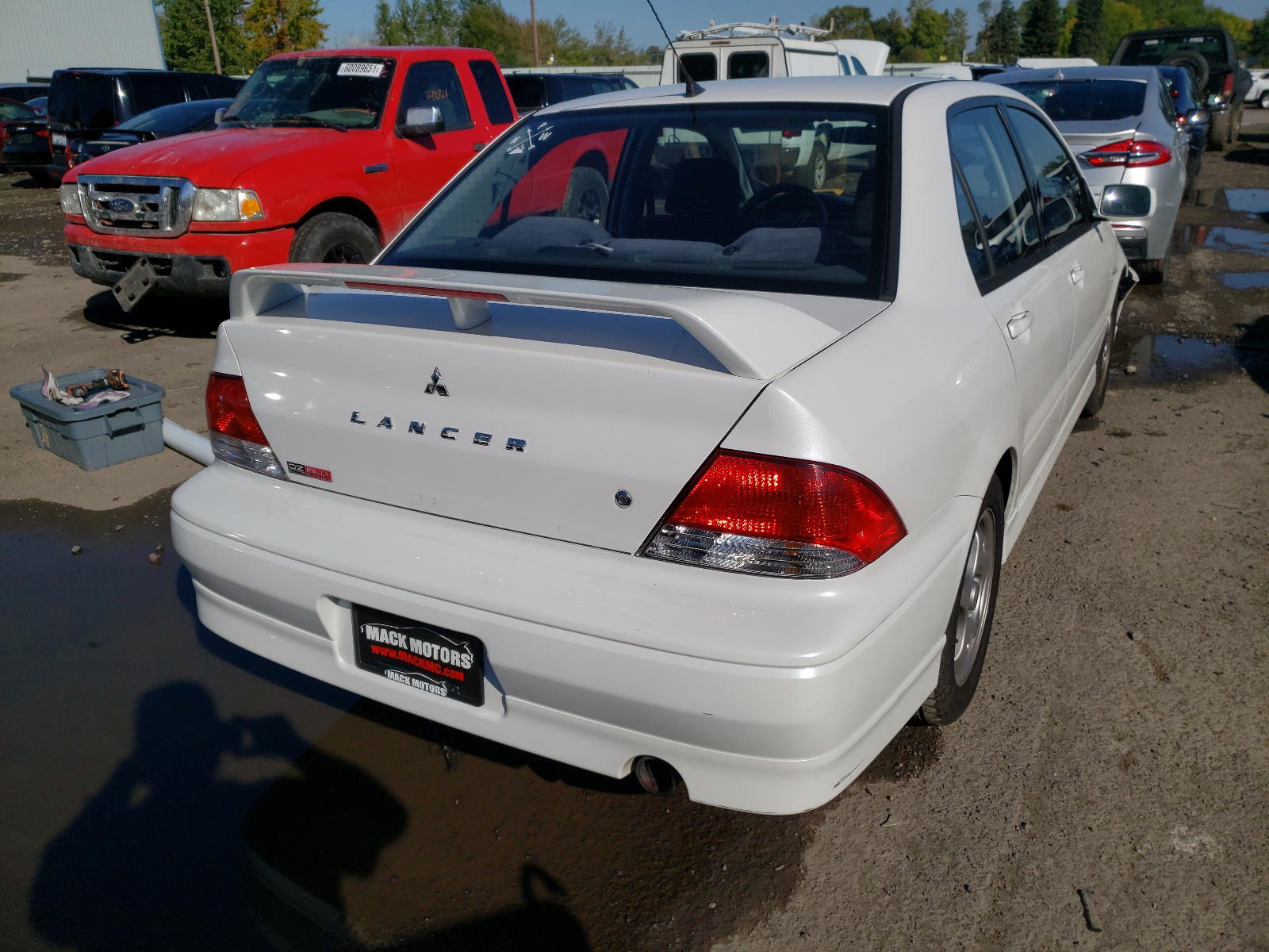 Photo 4 from auction – 2002 MITSUBISHI LANCER OZ with VIN JA3AJ86E02U059109