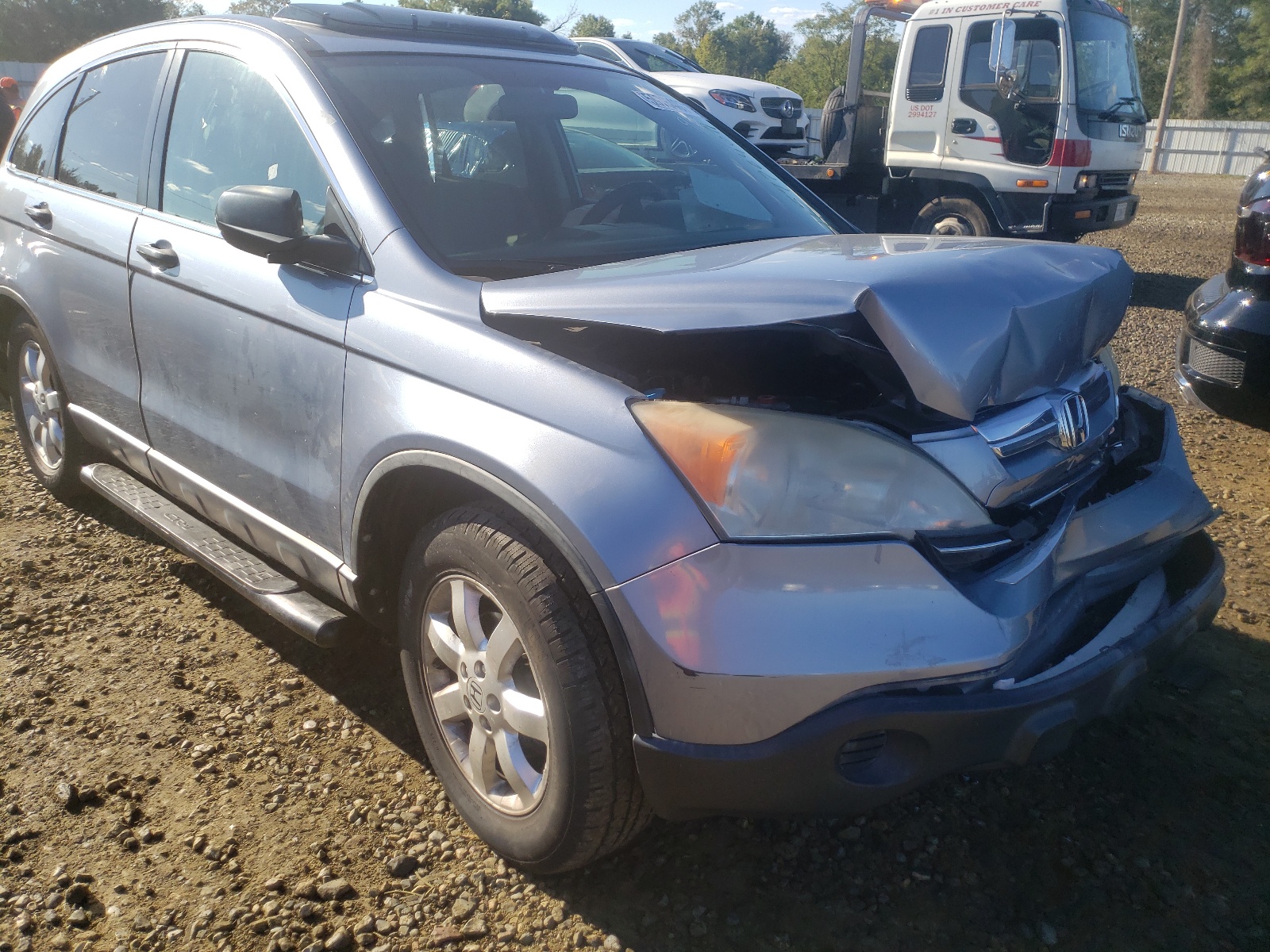 HONDA CR-V EX 2007 with VIN JHLRE38577C039433 - Photo from auction