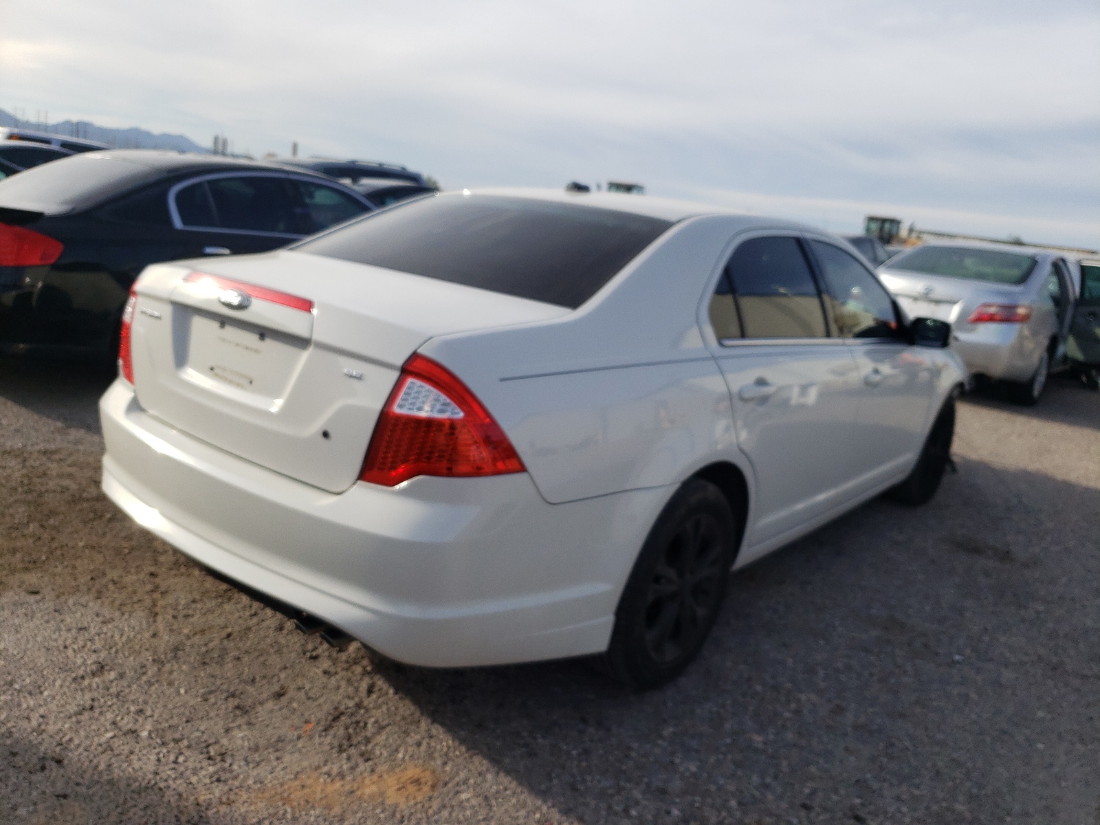 Photo 4 from auction – 2012 FORD FUSION SE with VIN 3FAHP0HA4CR299594