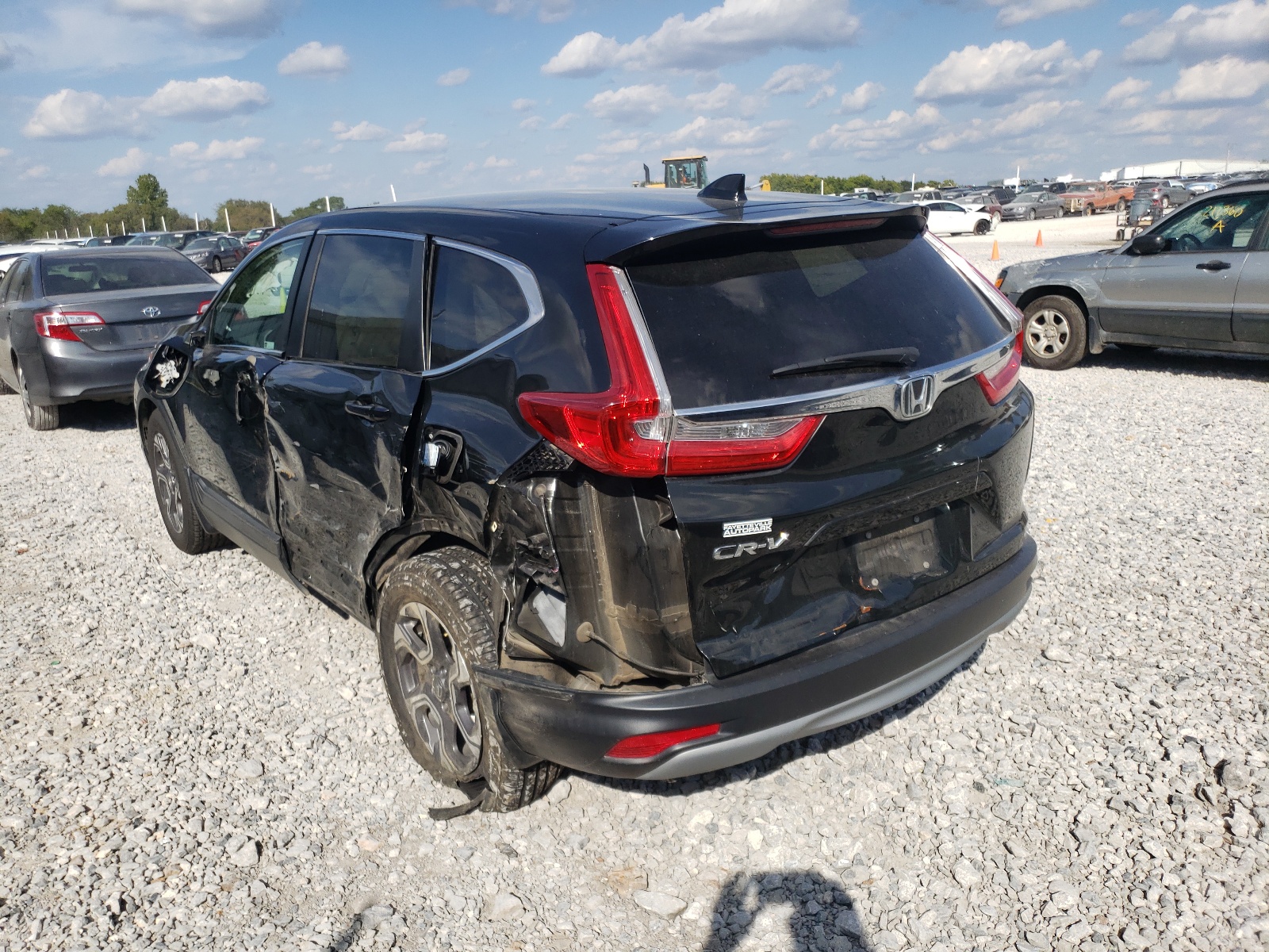 Photo 3 from auction – 2018 HONDA CR-V EX with VIN 7FARW1H54JE005690