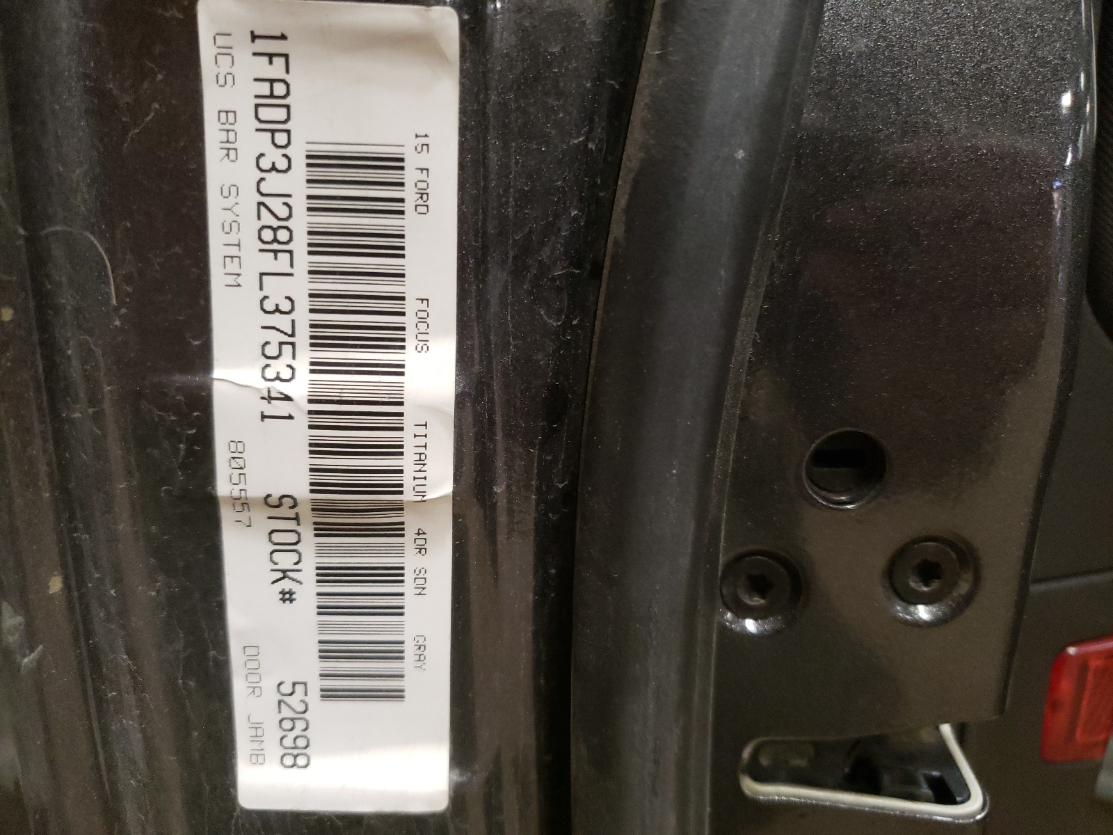 Photo 10 from auction – 2015 FORD FOCUS TITA with VIN 1FADP3J28FL375341