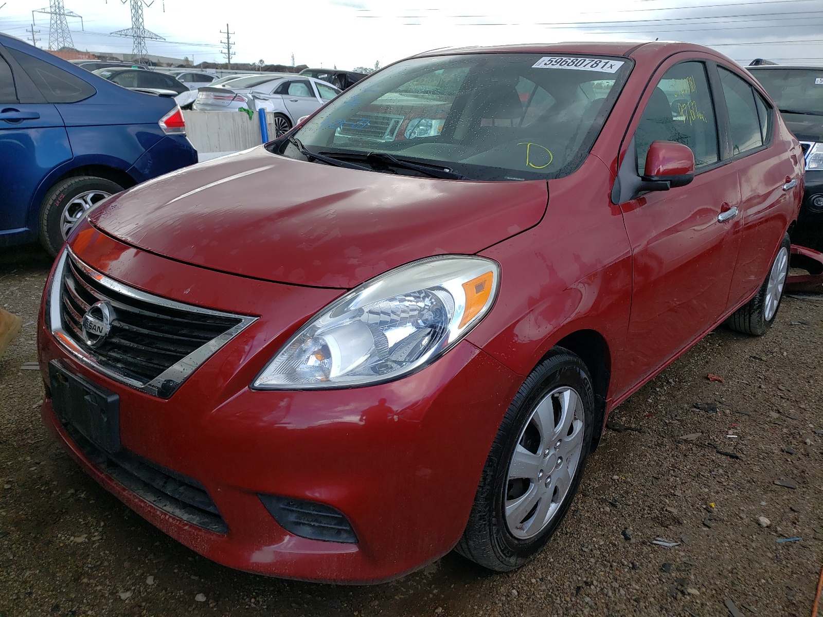 Photo 2 from auction – 2013 NISSAN VERSA S with VIN 3N1CN7AP2DL884117