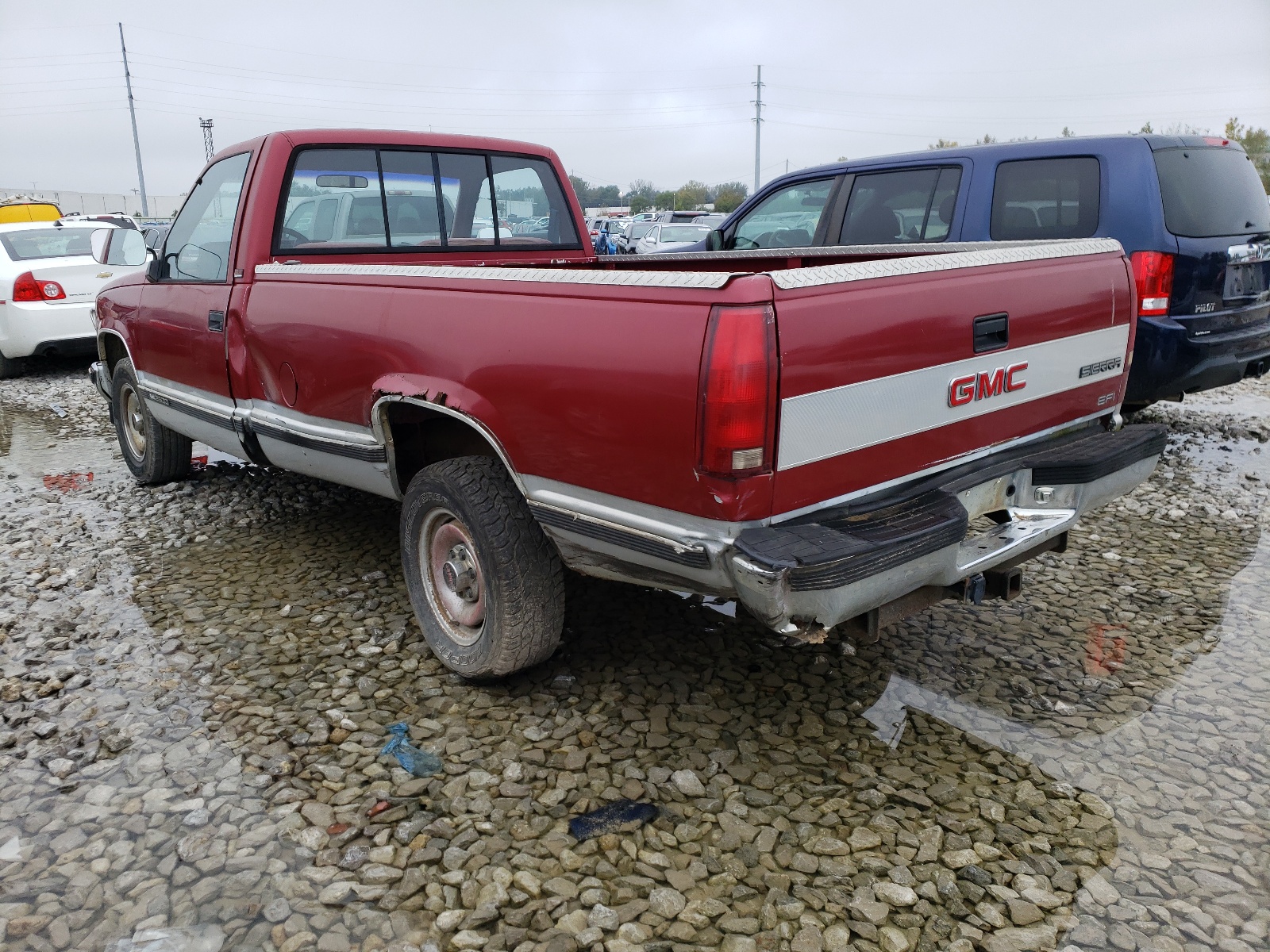 Photo 3 from auction – 1990 GMC SIERRA C25 with VIN 1GTFC24KXLE548152