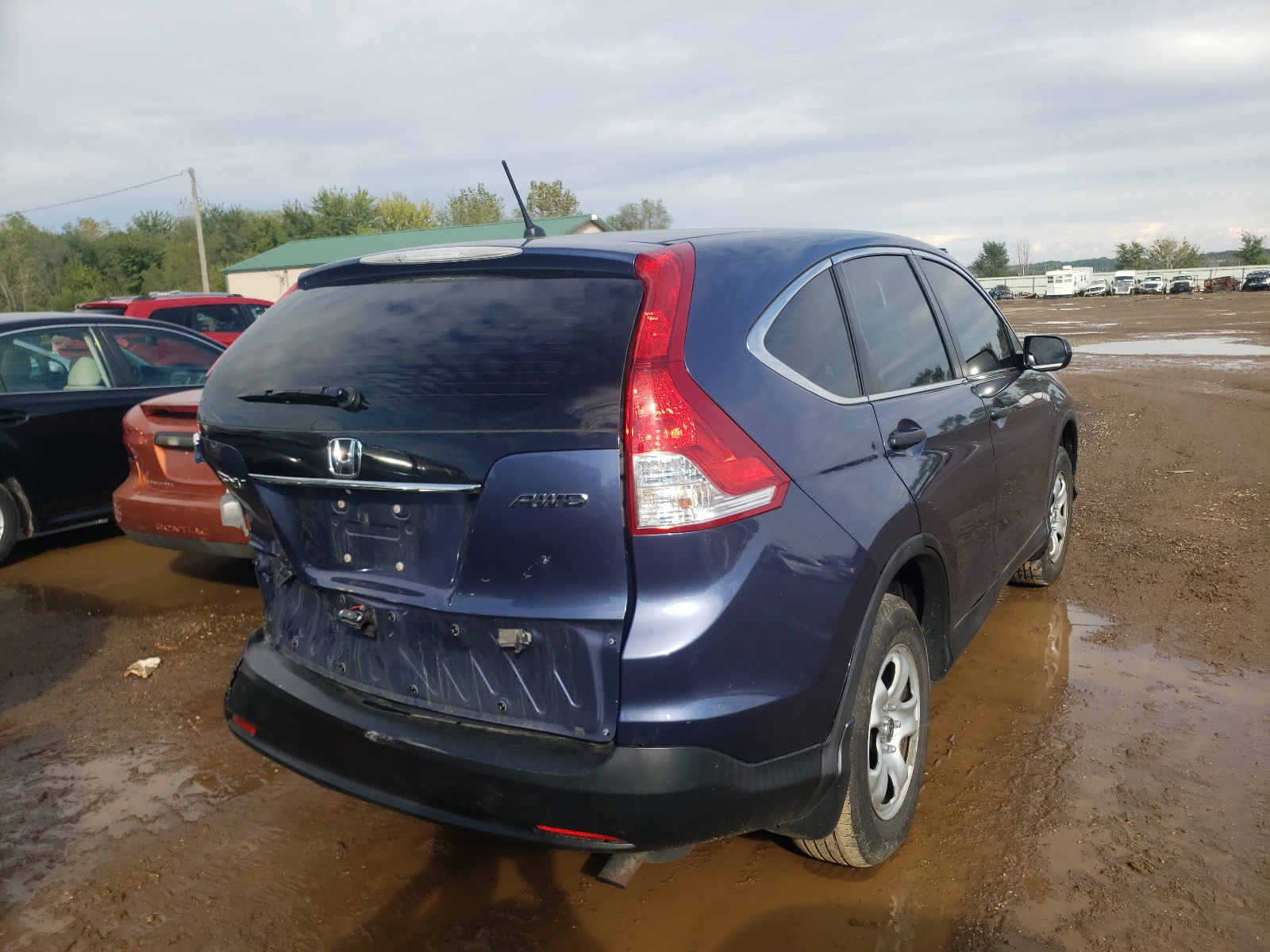 Photo 4 from auction – 2014 HONDA CR-V LX with VIN 2HKRM4H36EH696293
