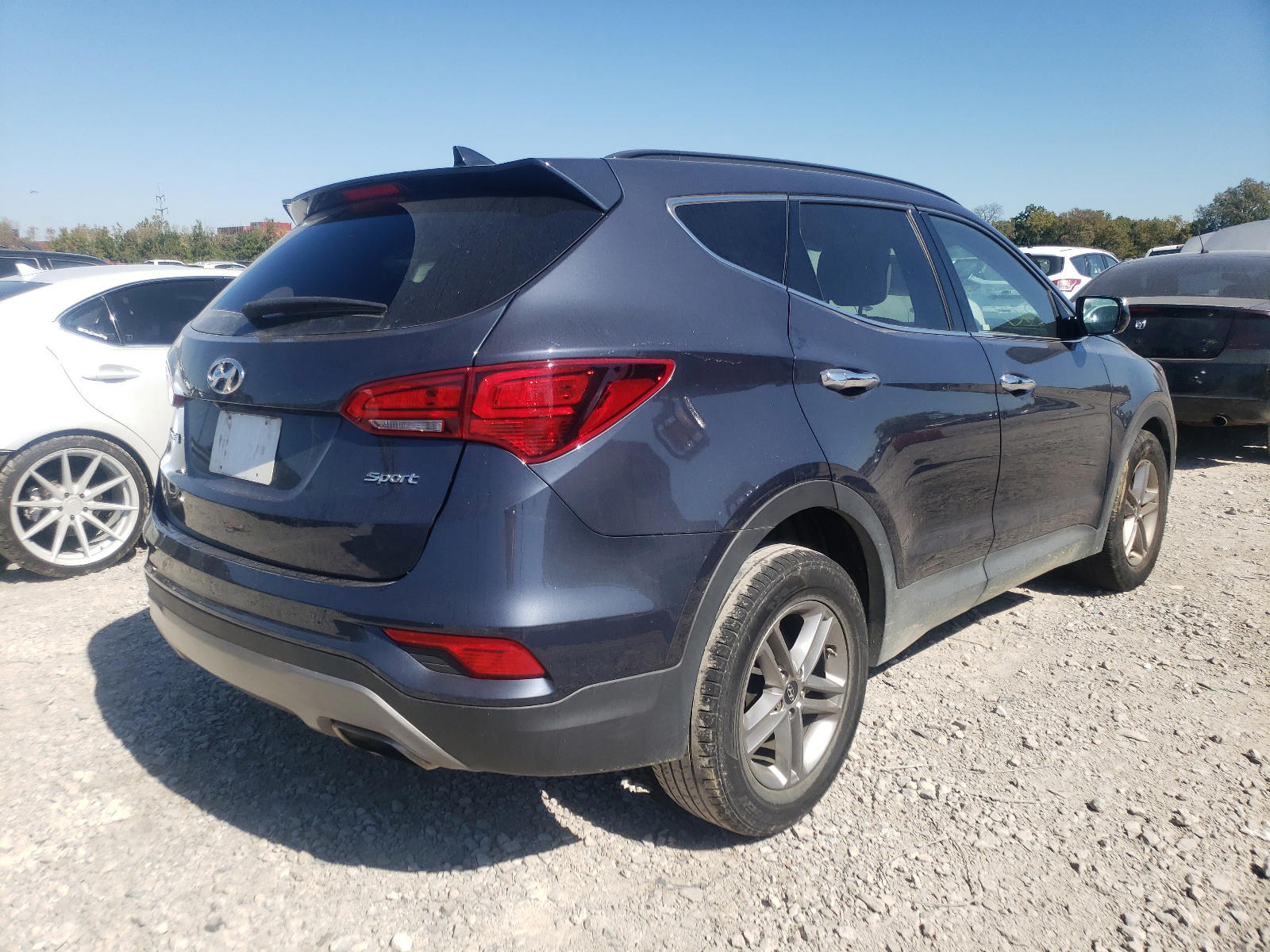 Photo 4 from auction – 2017 HYUNDAI SANTA FE S with VIN 5NMZU3LB2HH049917