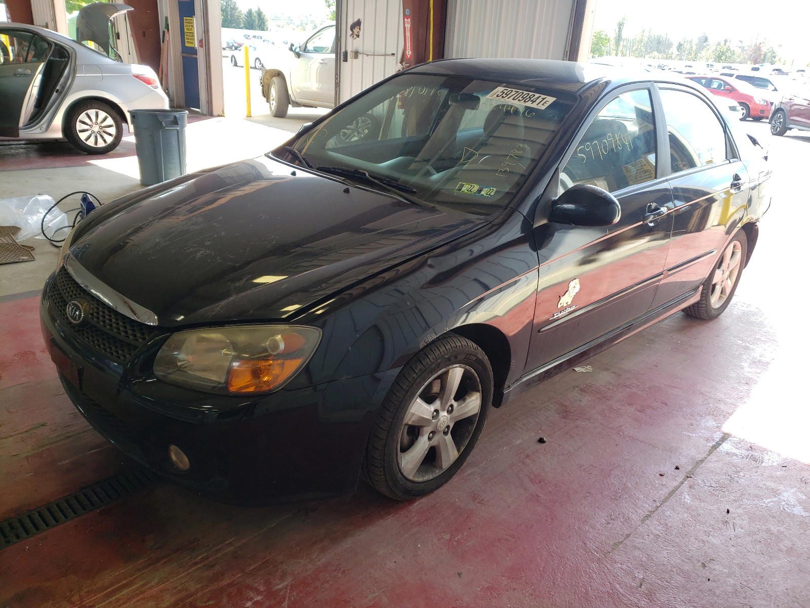 Photo 2 from auction – 2009 KIA SPECTRA EX with VIN KNAFE222495024496