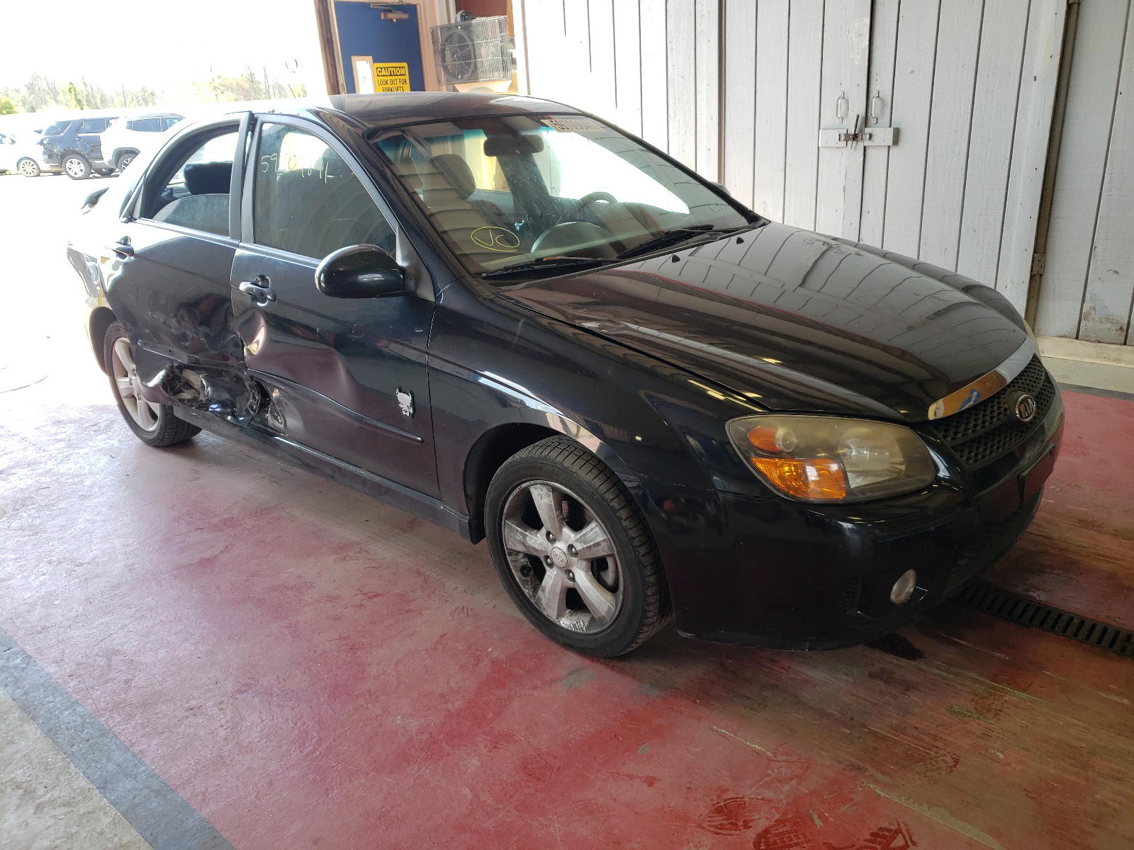 KIA SPECTRA EX 2009 with VIN KNAFE222495024496 - Photo from auction