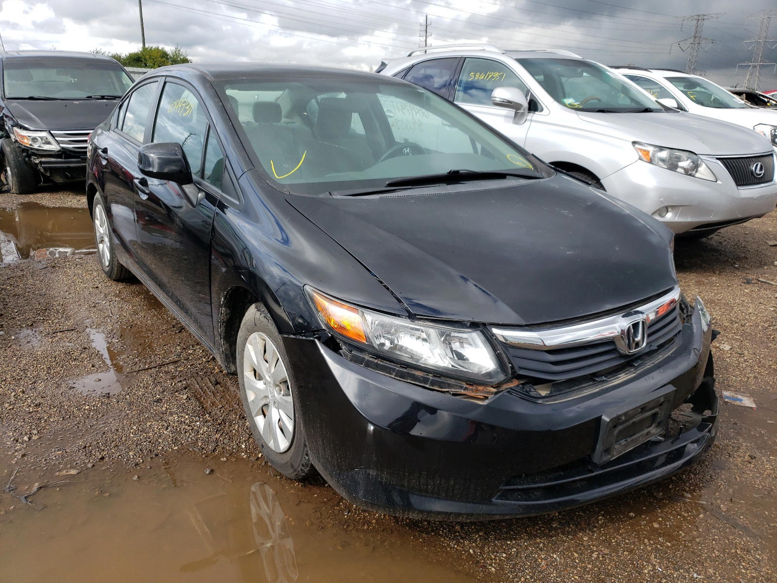 HONDA CIVIC LX 2012 with VIN 19XFB2F51CE056883 - Photo from auction