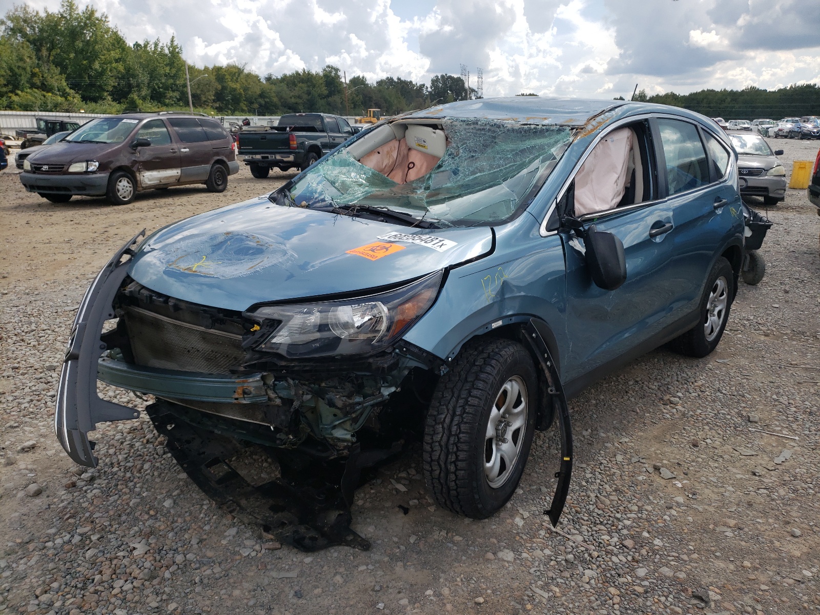Photo 2 from auction – 2014 HONDA CR-V LX with VIN 2HKRM3H39EH508246