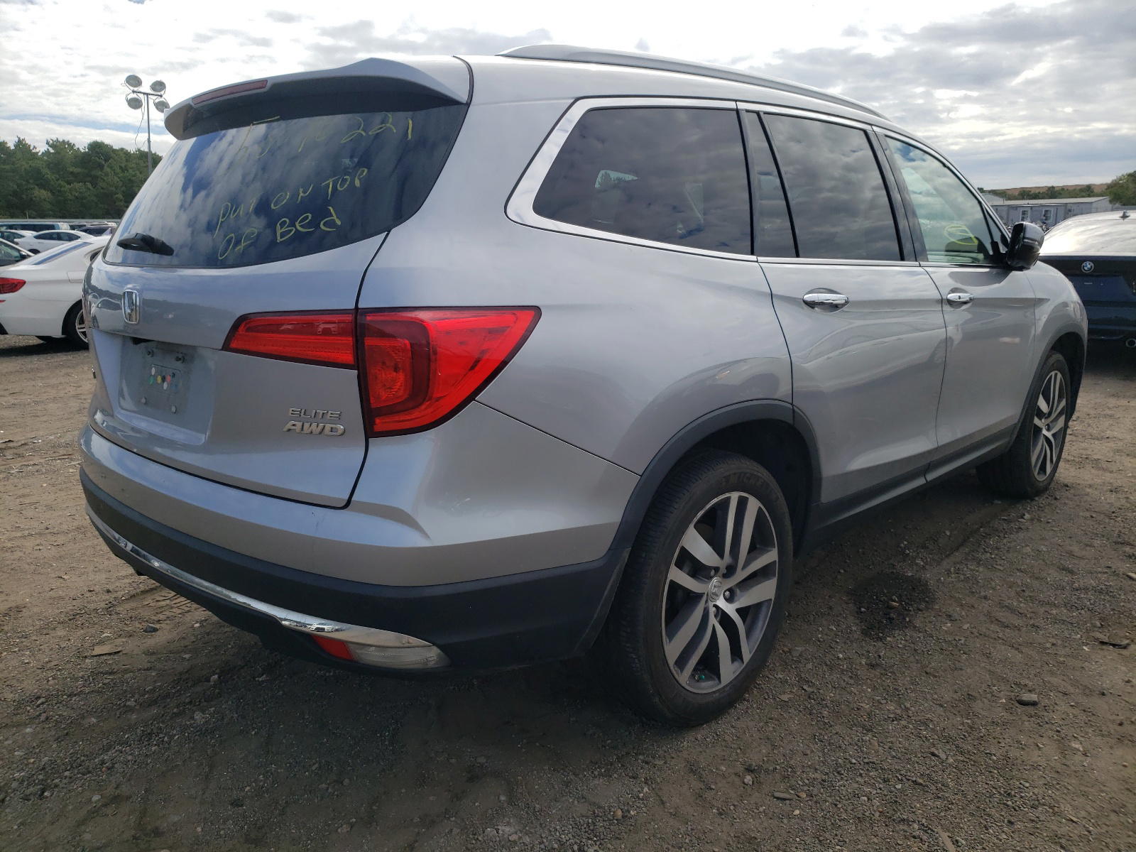 Photo 4 from auction – 2016 HONDA PILOT ELIT with VIN 5FNYF6H06GB027367