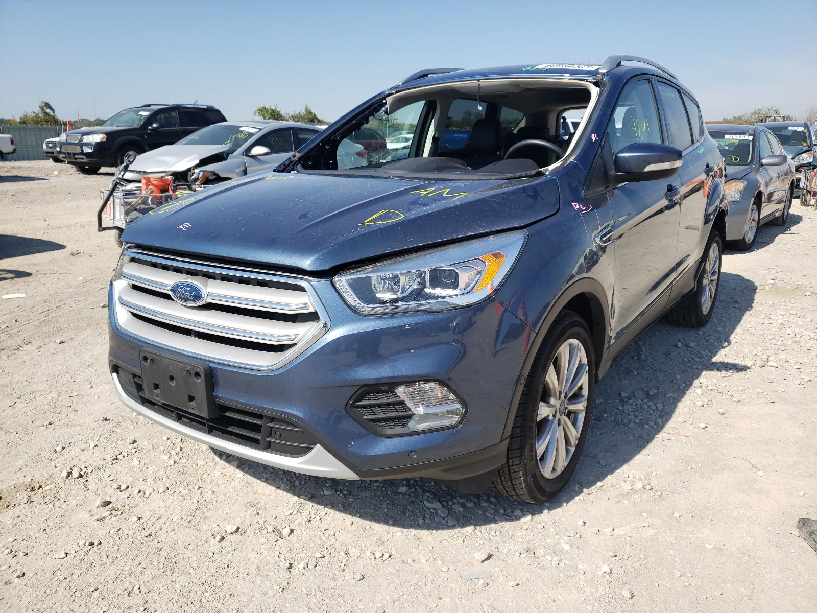 Photo 2 from auction – 2018 FORD ESCAPE TIT with VIN 1FMCU9J98JUB02428