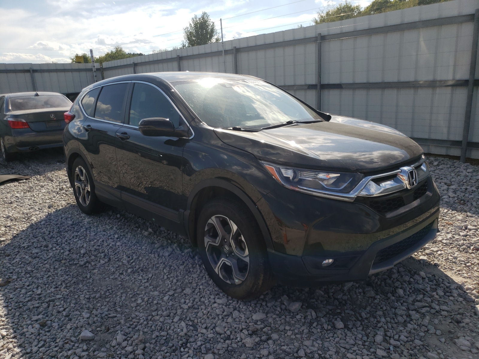 HONDA CR-V EX 2018 with VIN 7FARW1H54JE005690 - Photo from auction