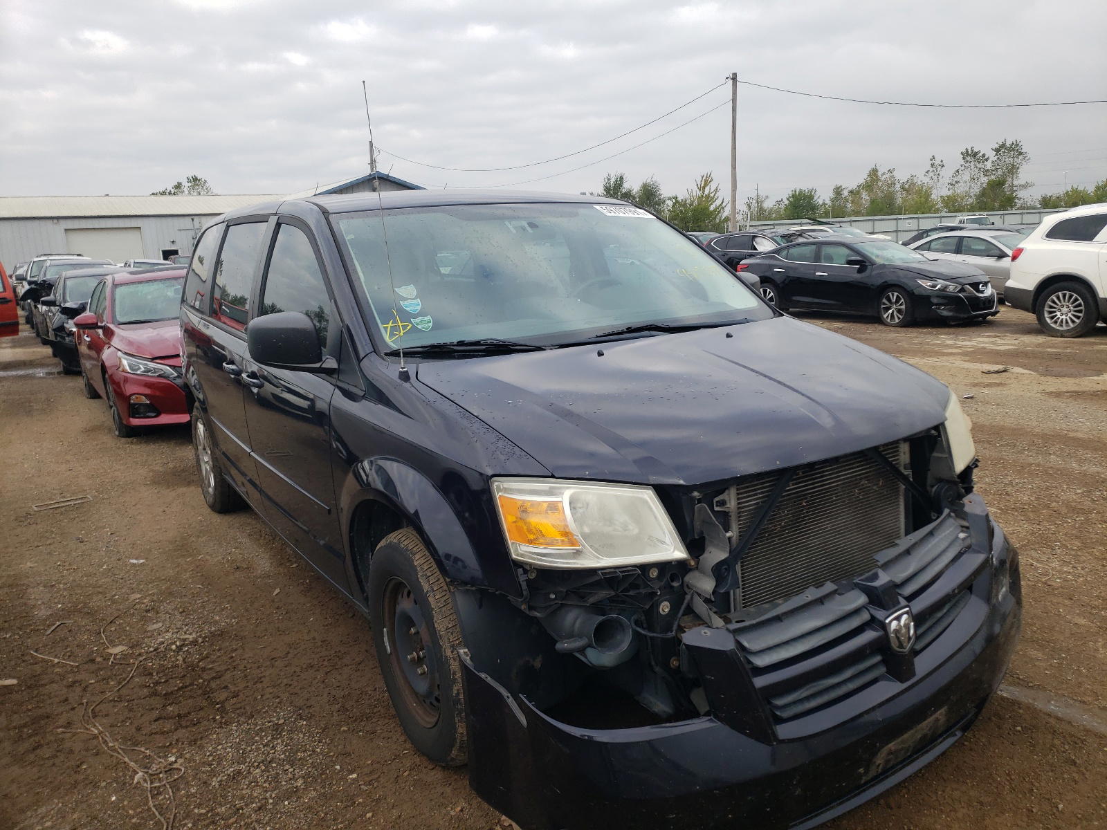 DODGE GRAND CARA 2010 with VIN 2D4RN4DE2AR489517 - Photo from auction