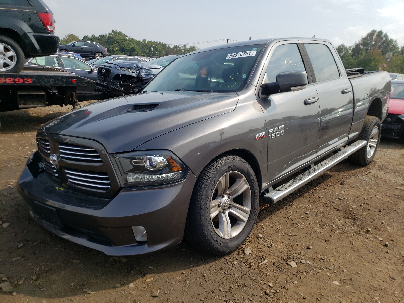 Photo 2 from auction – 2014 RAM 1500 SPORT with VIN 1C6RR7UT8ES402040