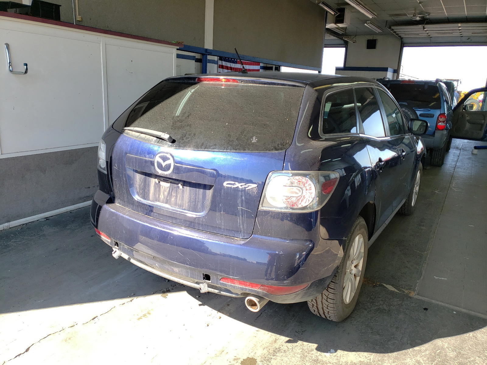 Photo 4 from auction – 2011 MAZDA CX-7 with VIN JM3ER2B50B0359875