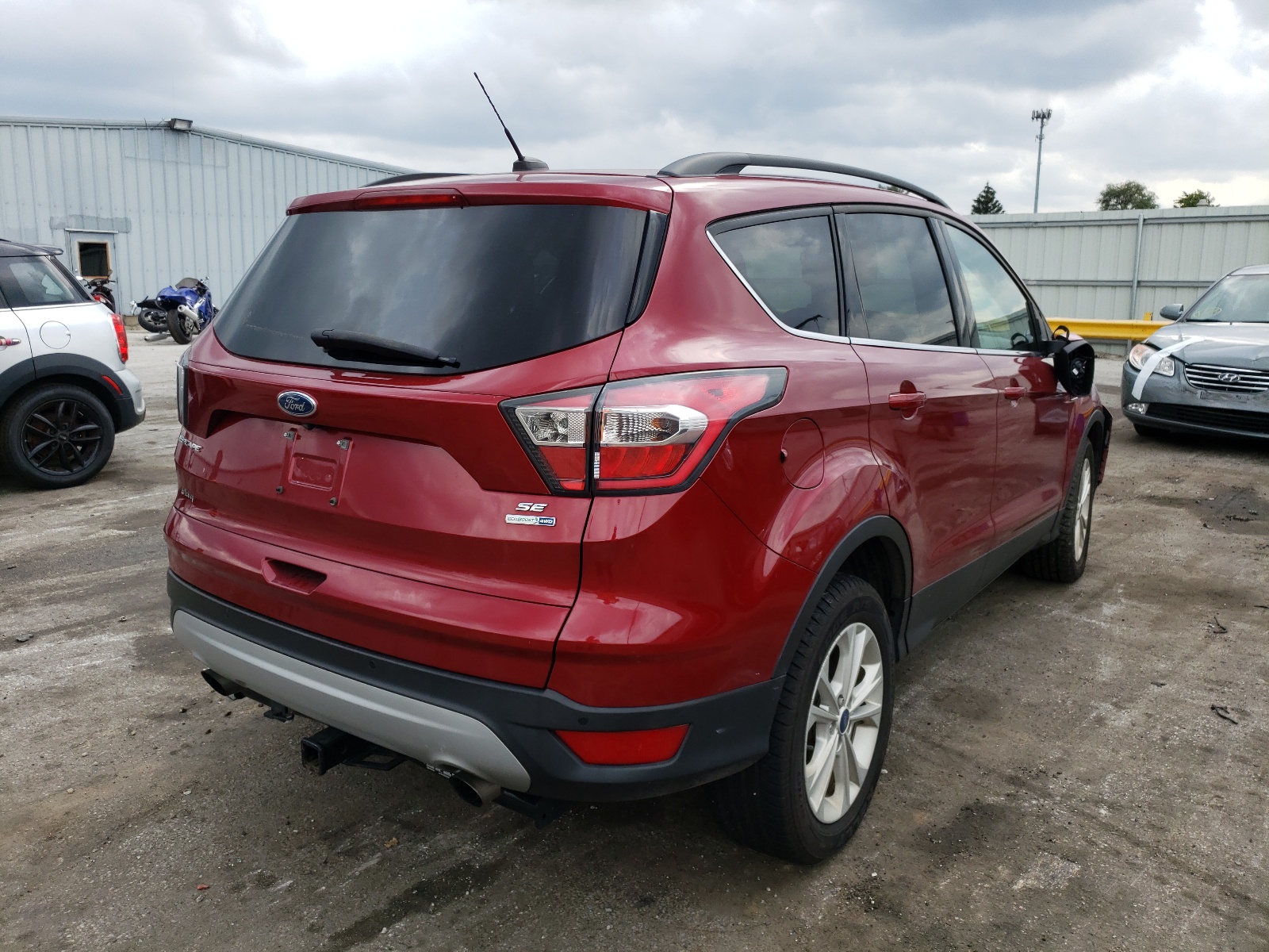 Photo 4 from auction – 2017 FORD ESCAPE SE with VIN 1FMCU9GD1HUA16156