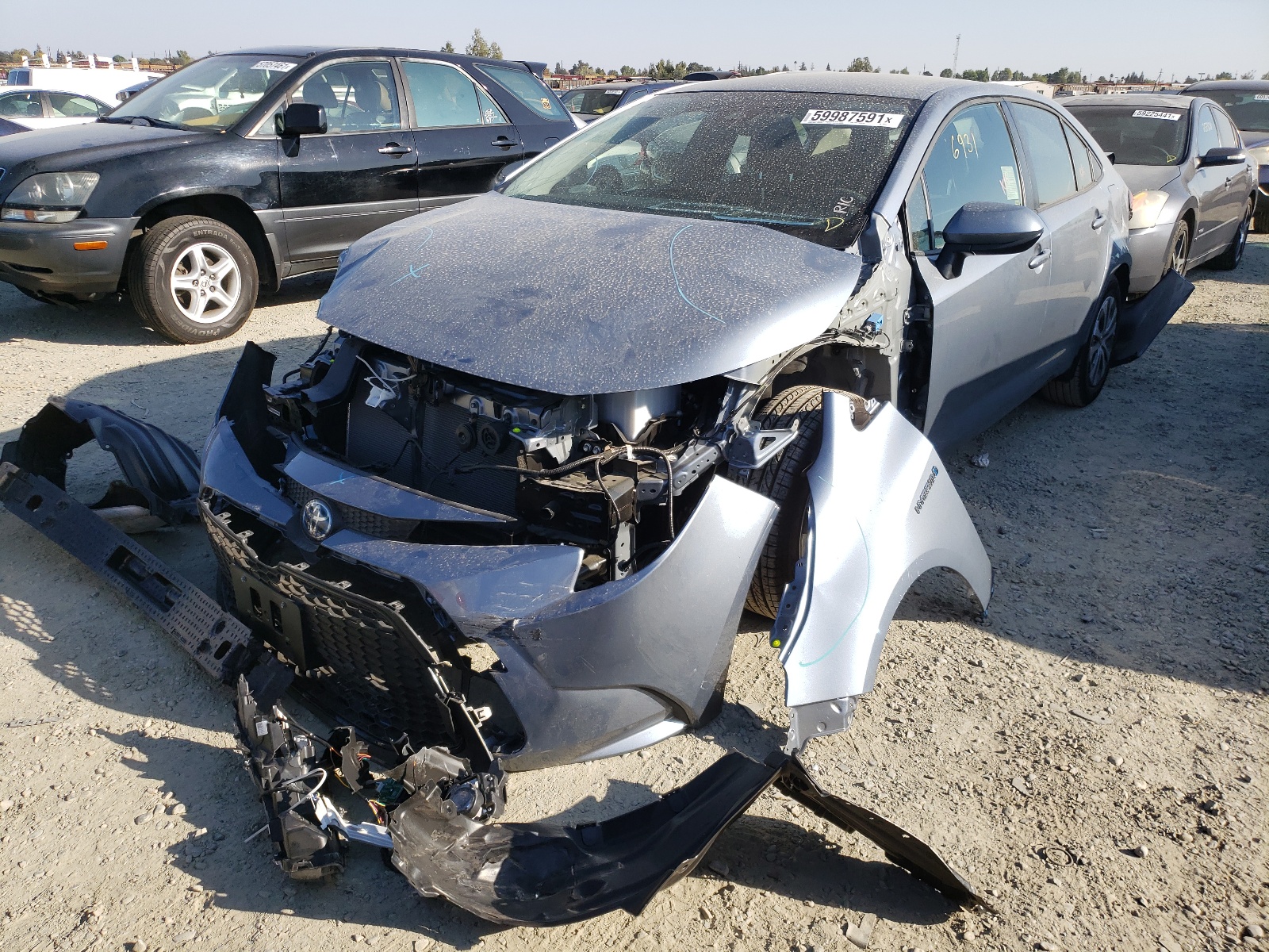 Photo 2 from auction – 2021 TOYOTA COROLLA LE with VIN JTDEAMDE8MJ030203