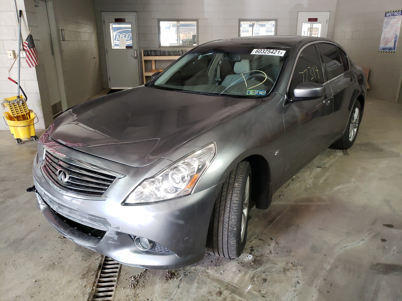 Photo 2 from auction – 2015 INFINITI Q40 with VIN JN1CV6AR6FM650325