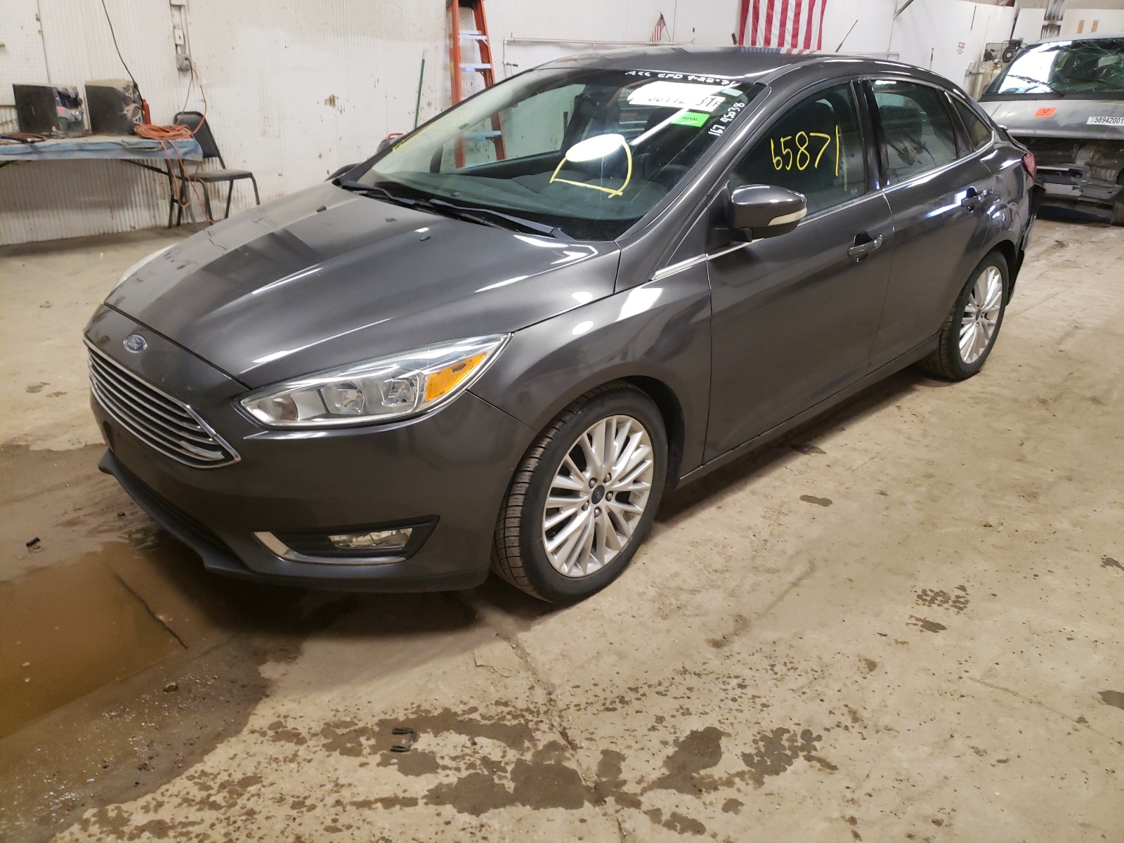 Photo 2 from auction – 2015 FORD FOCUS TITA with VIN 1FADP3J28FL375341