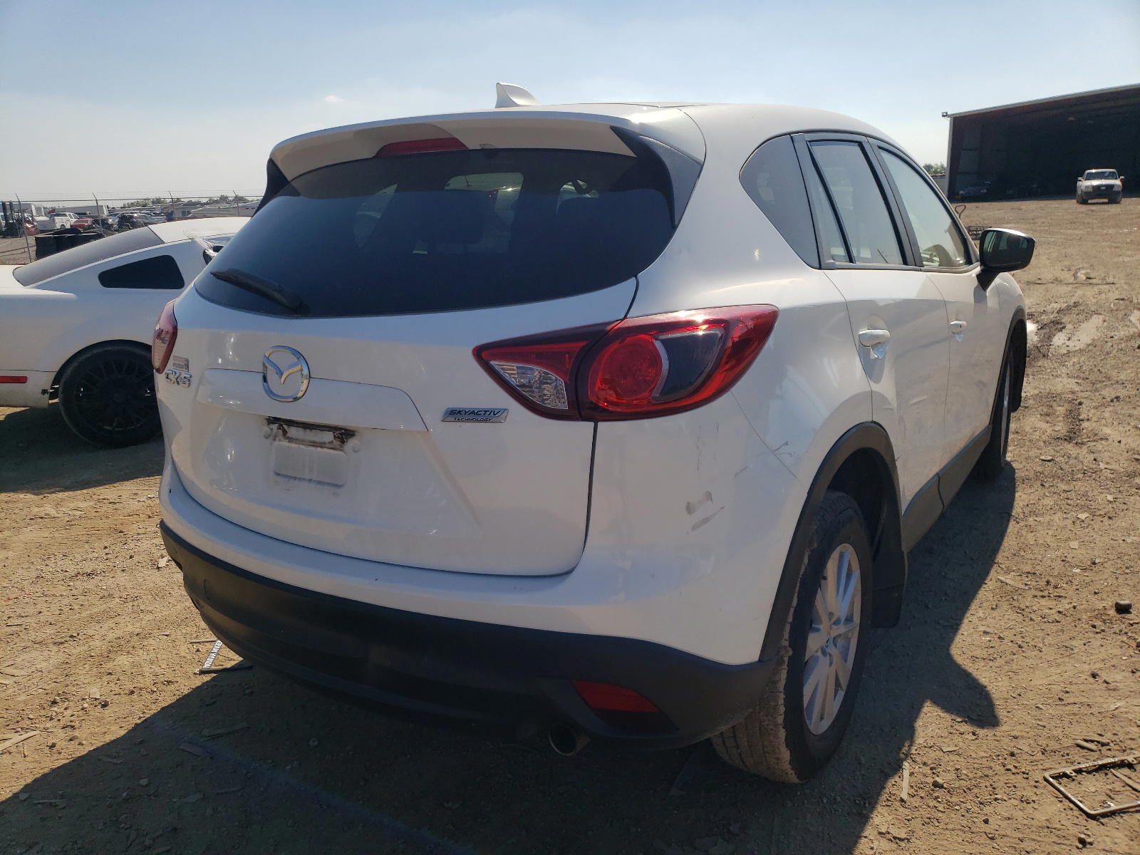 Photo 4 from auction – 2015 MAZDA CX-5 TOURI with VIN JM3KE2CY0F0469211