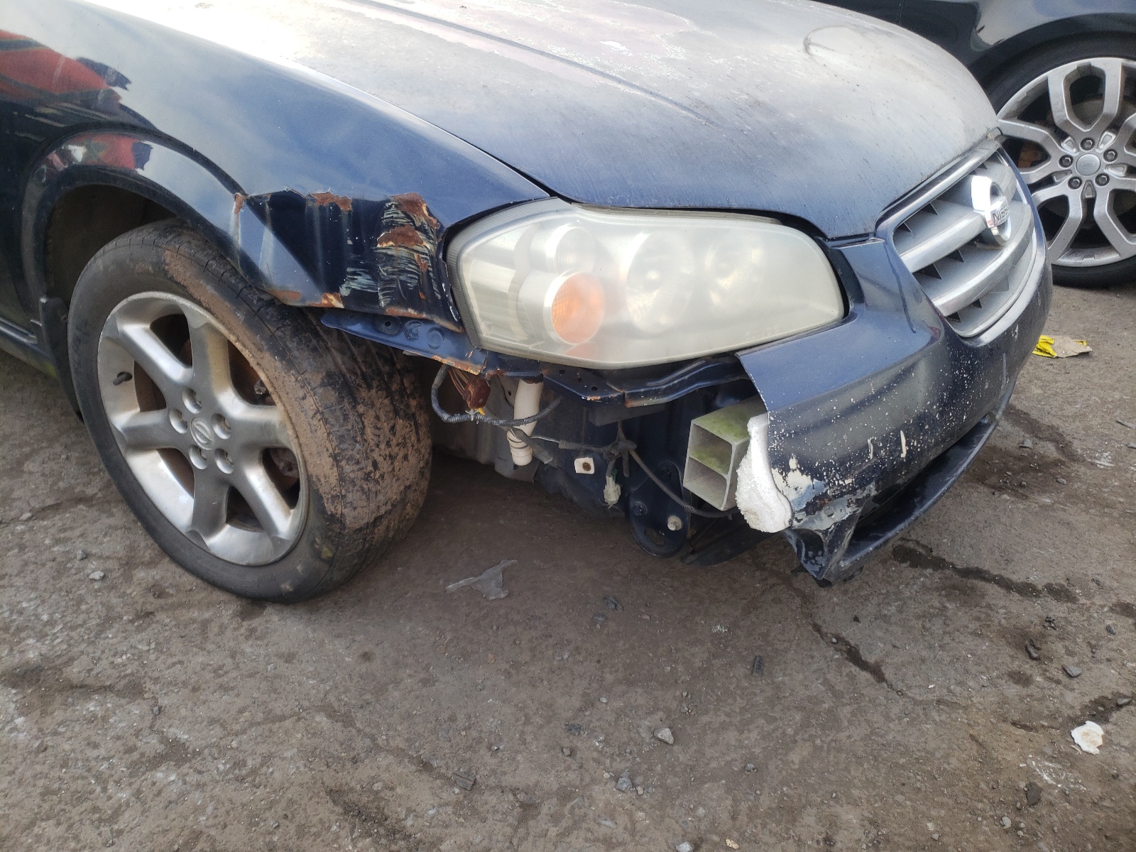 Photo 9 from auction – 2003 NISSAN MAXIMA GLE with VIN JN1DA31AX3T437596
