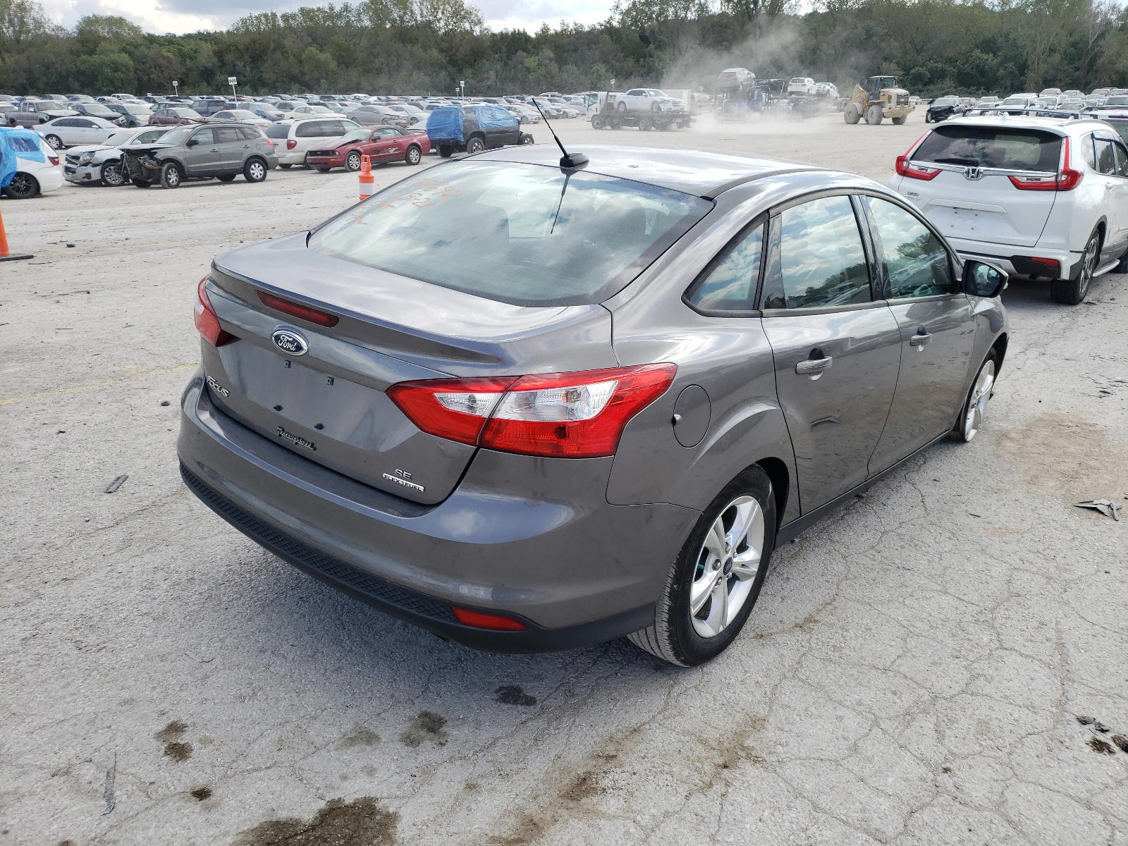 Photo 4 from auction – 2013 FORD FOCUS SE with VIN 1FADP3F20DL352223
