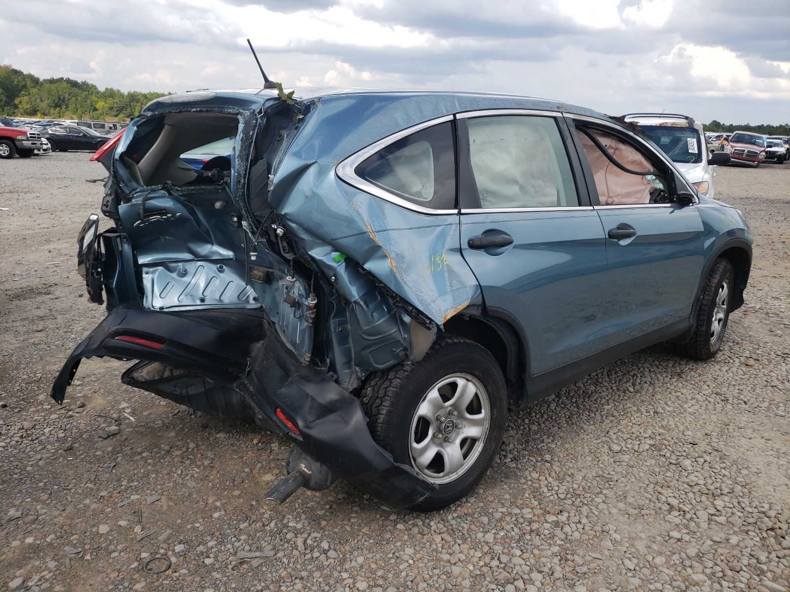 Photo 4 from auction – 2014 HONDA CR-V LX with VIN 2HKRM3H39EH508246