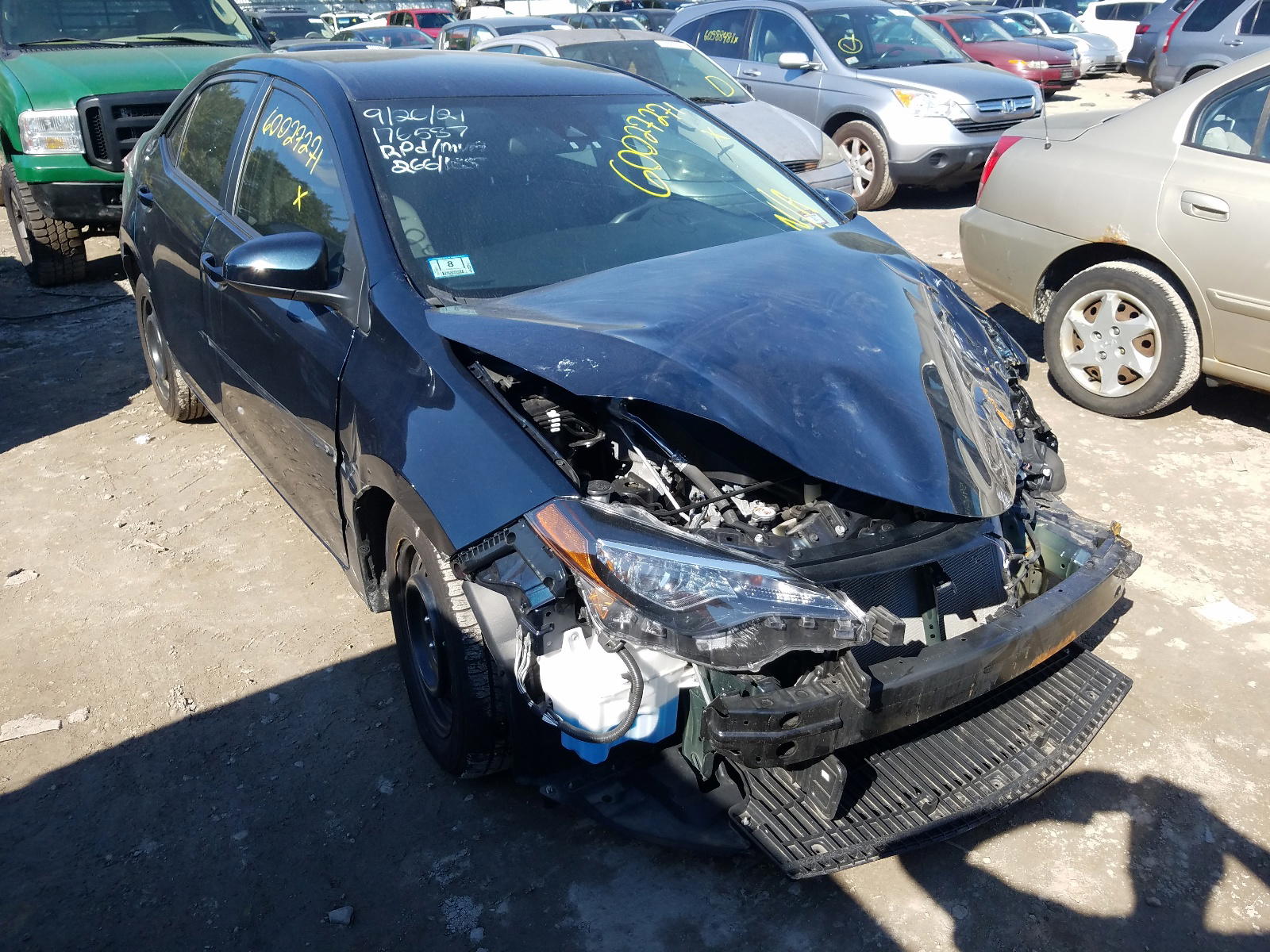 TOYOTA COROLLA L 2019 with VIN 2T1BURHEXKC232115 - Photo from auction