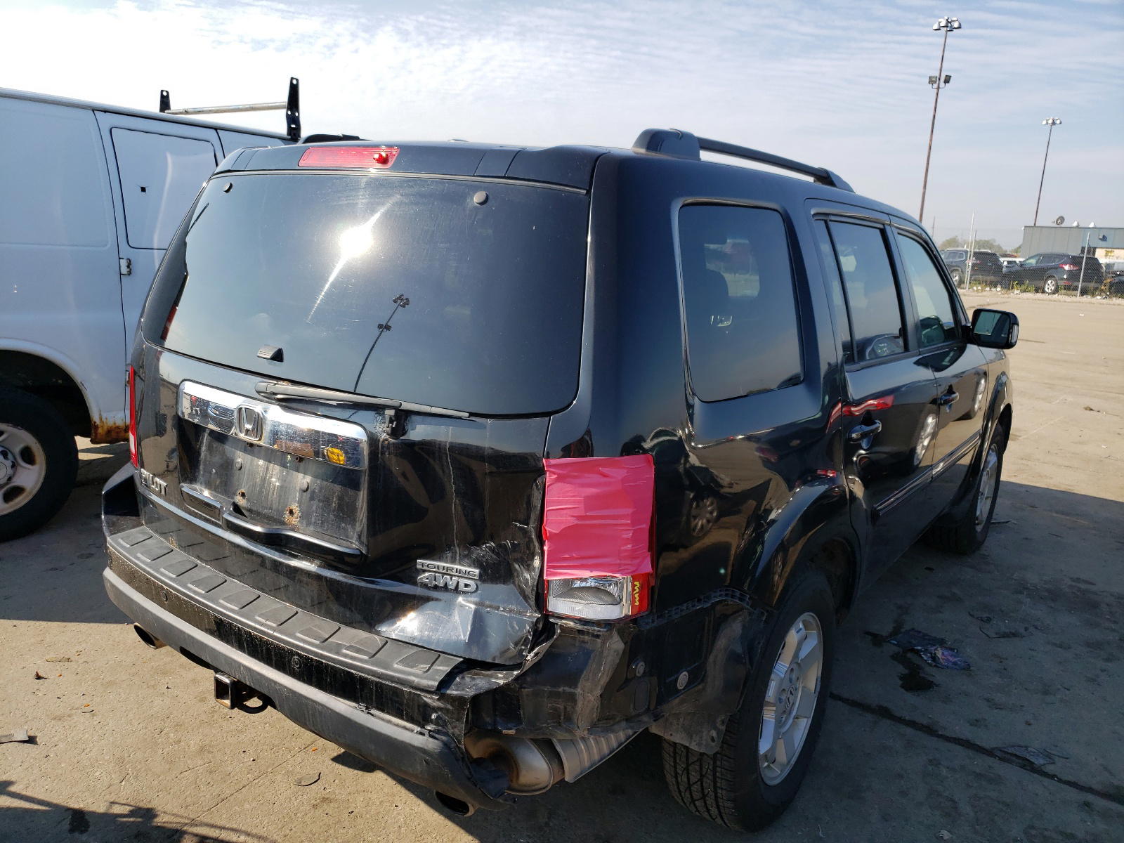Photo 4 from auction – 2011 HONDA PILOT TOUR with VIN 5FNYF4H96BB501314