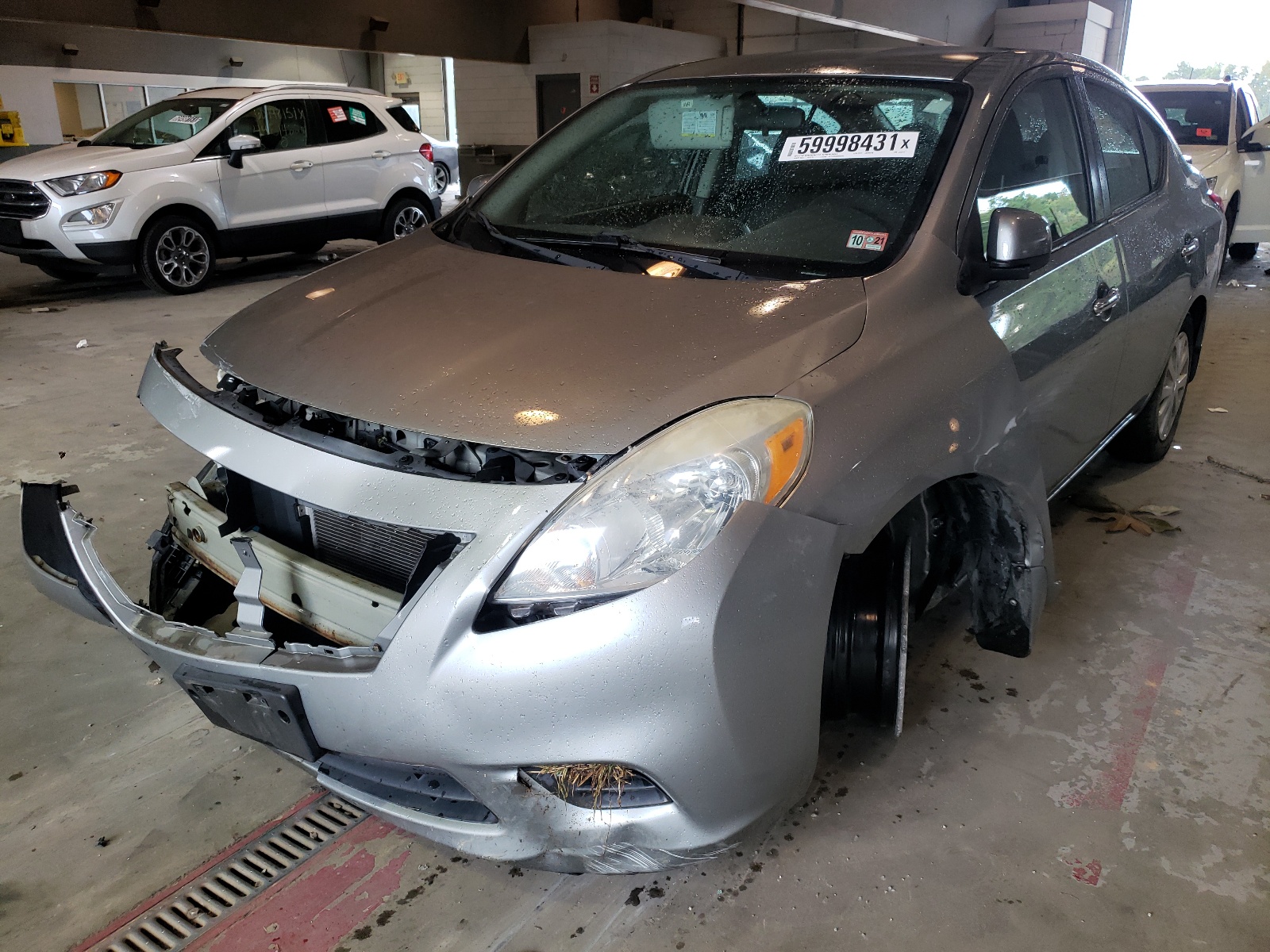 Photo 2 from auction – 2013 NISSAN VERSA S with VIN 3N1CN7AP3DL836772