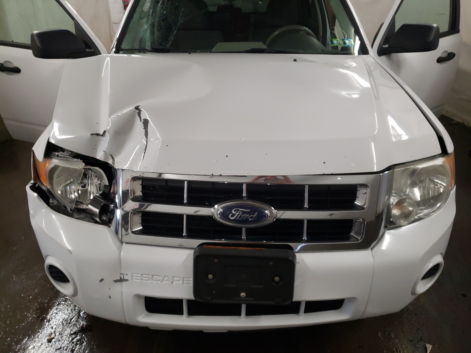 Photo 7 from auction – 2009 FORD ESCAPE XLS with VIN 1FMCU92749KC38706