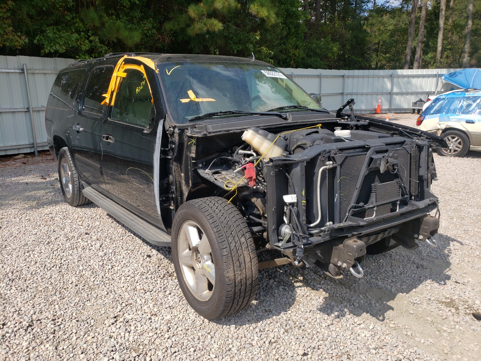 CHEVROLET SUBURBAN C 2012 with VIN 1GNSCJE01CR265791 - Photo from auction