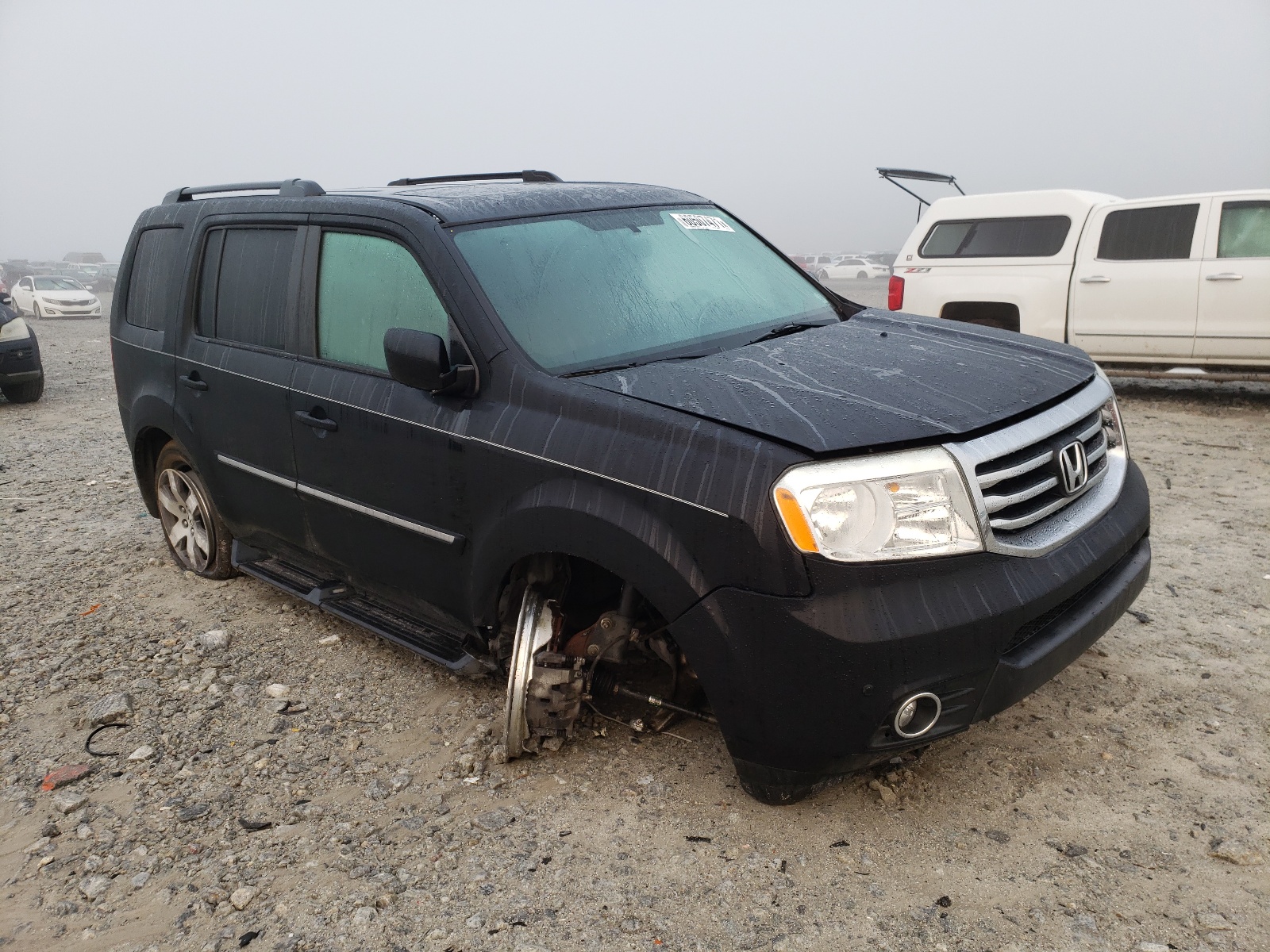HONDA PILOT TOUR 2013 with VIN 5FNYF4H92DB052779 - Photo from auction