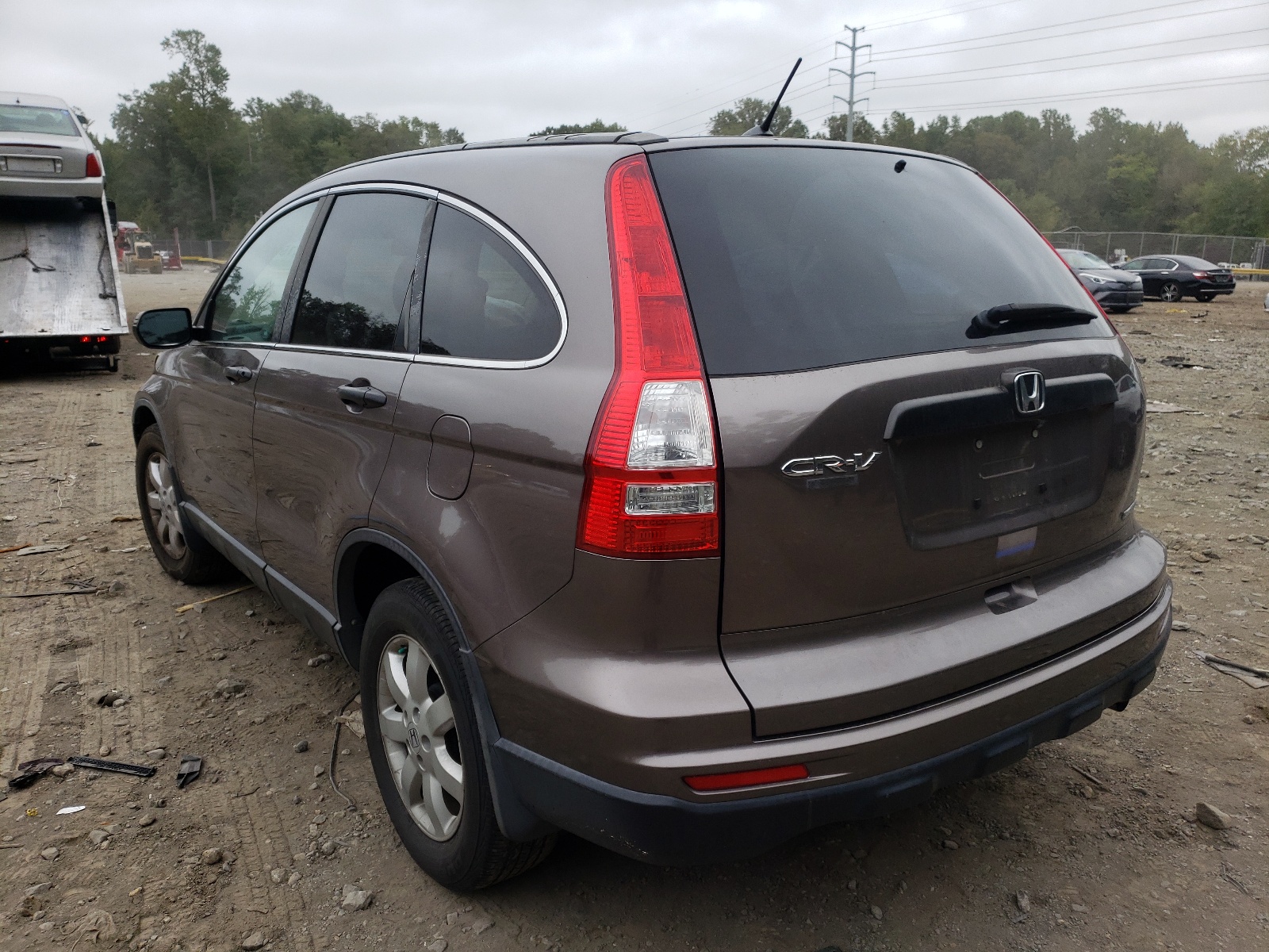 Photo 3 from auction – 2011 HONDA CR-V SE with VIN 5J6RE3H45BL010844