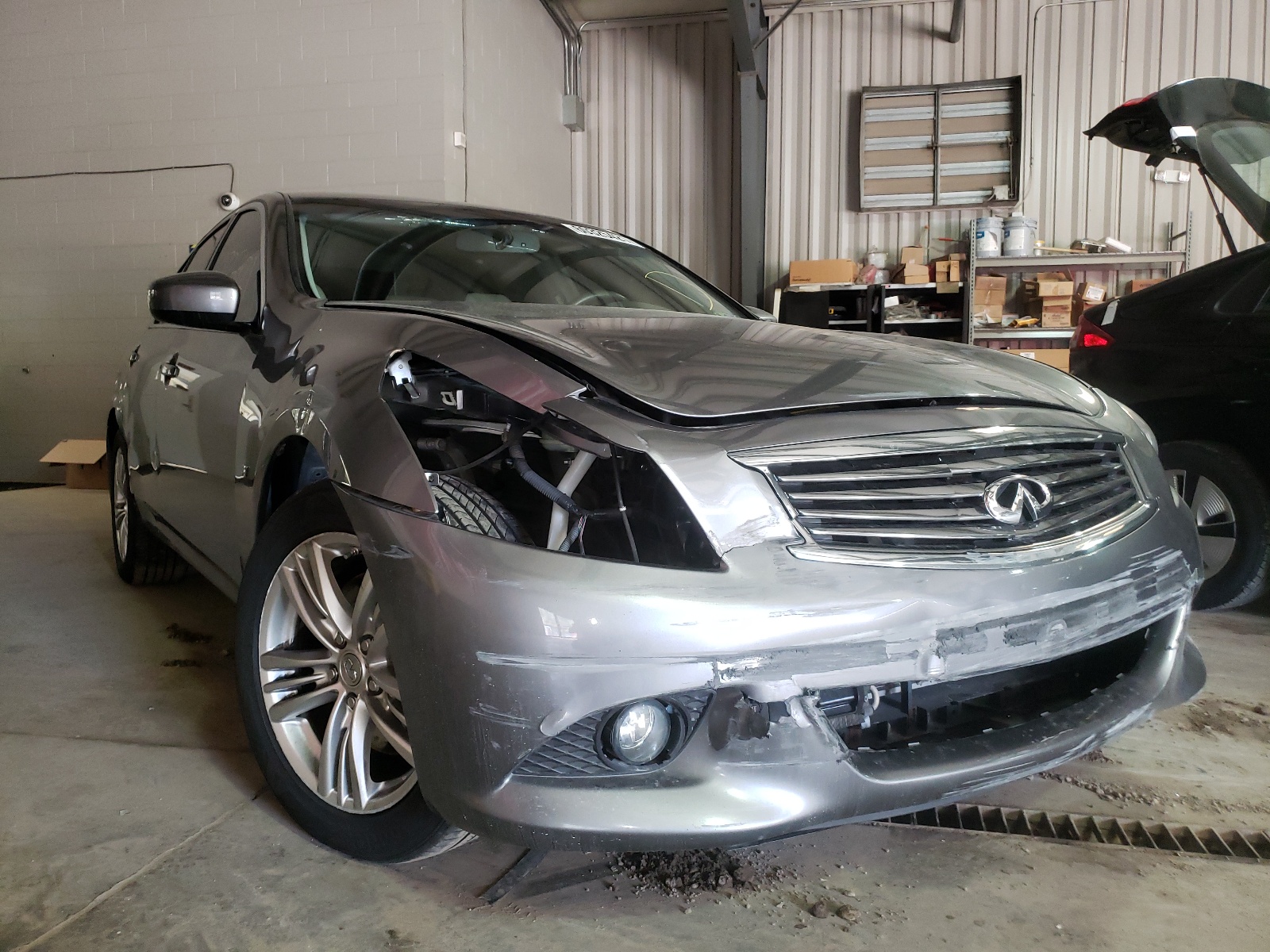 Photo 9 from auction – 2015 INFINITI Q40 with VIN JN1CV6AR6FM650325