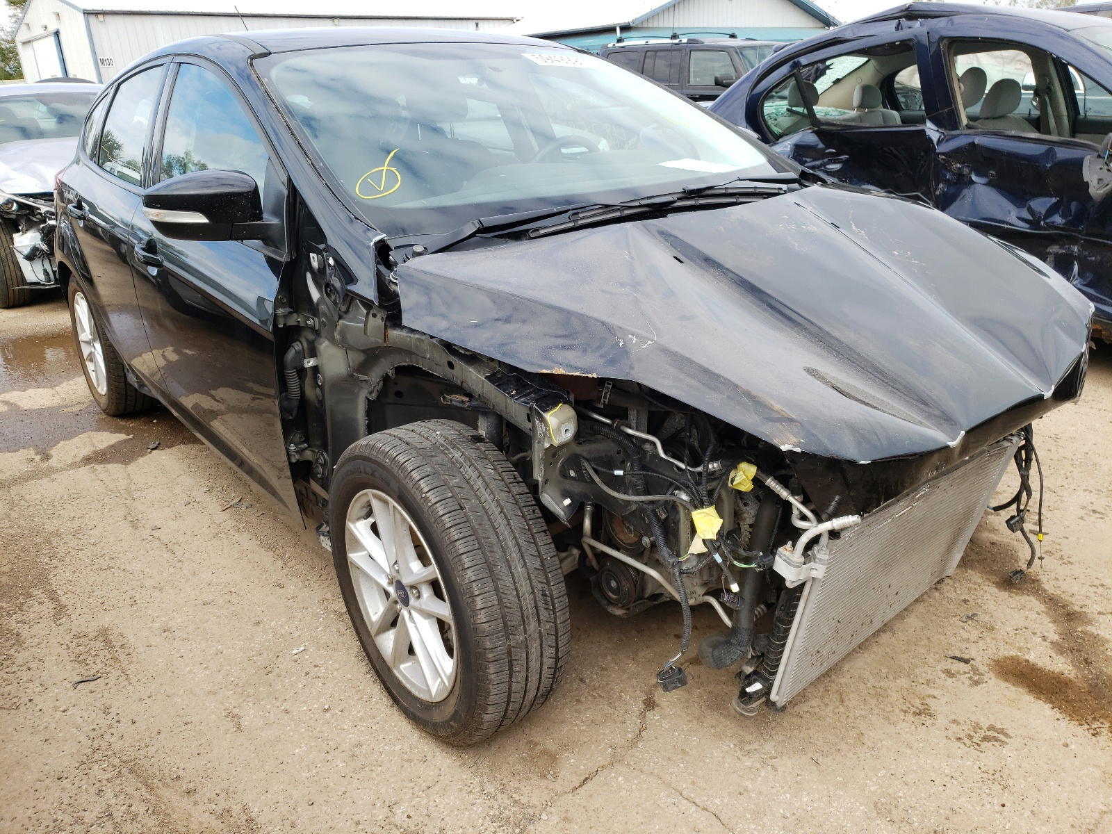 FORD FOCUS SE 2018 with VIN 1FADP3K28JL320329 - Photo from auction