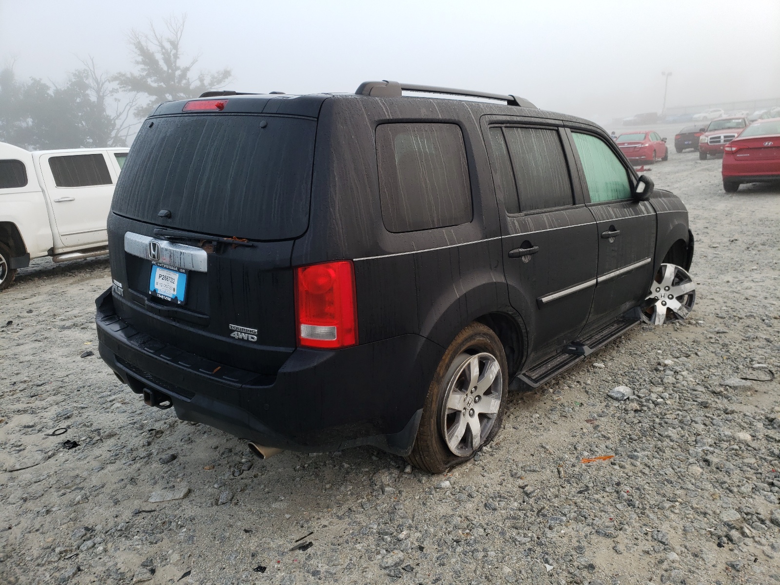 Photo 4 from auction – 2013 HONDA PILOT TOUR with VIN 5FNYF4H92DB052779