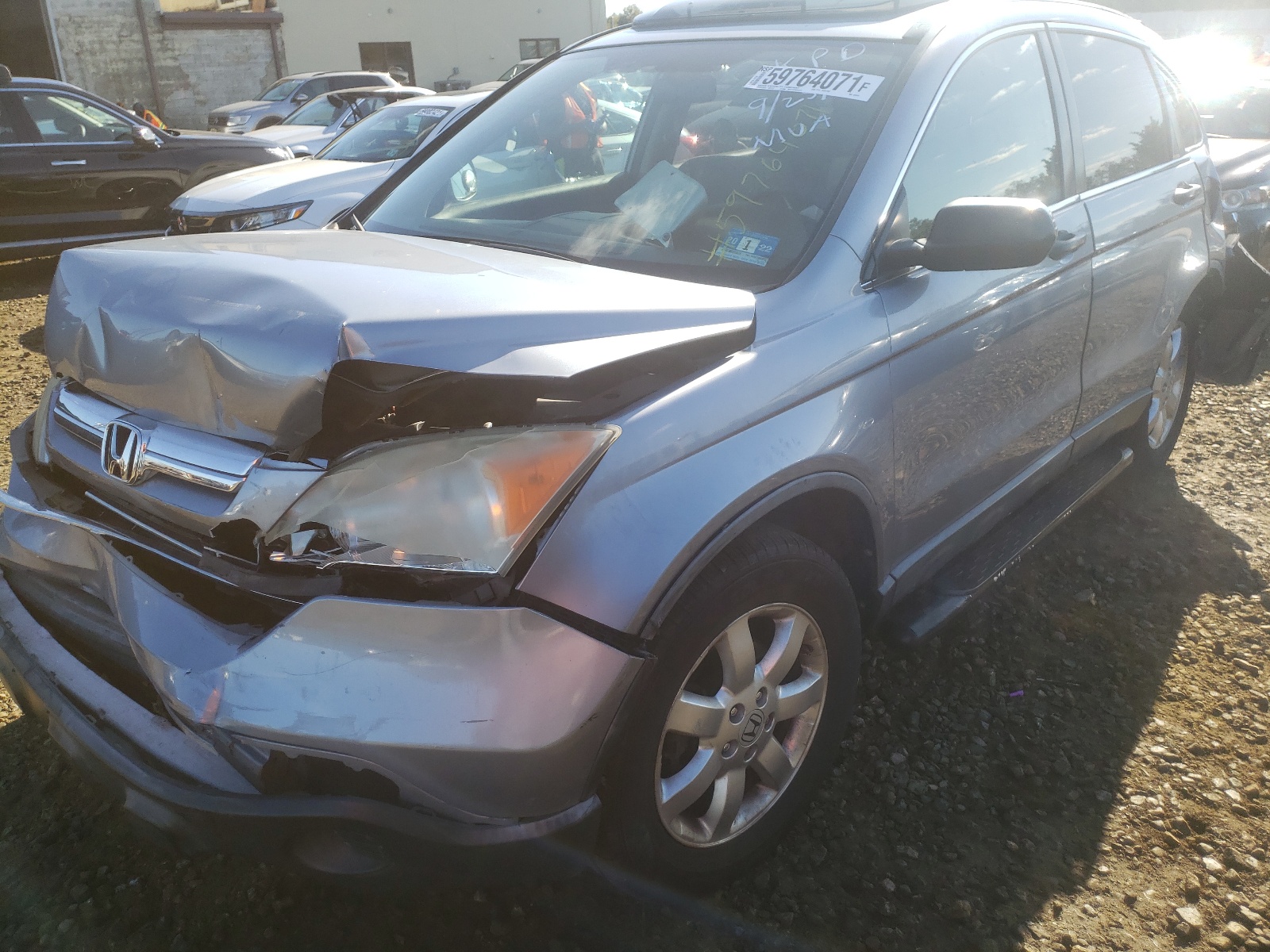 Photo 2 from auction – 2007 HONDA CR-V EX with VIN JHLRE38577C039433