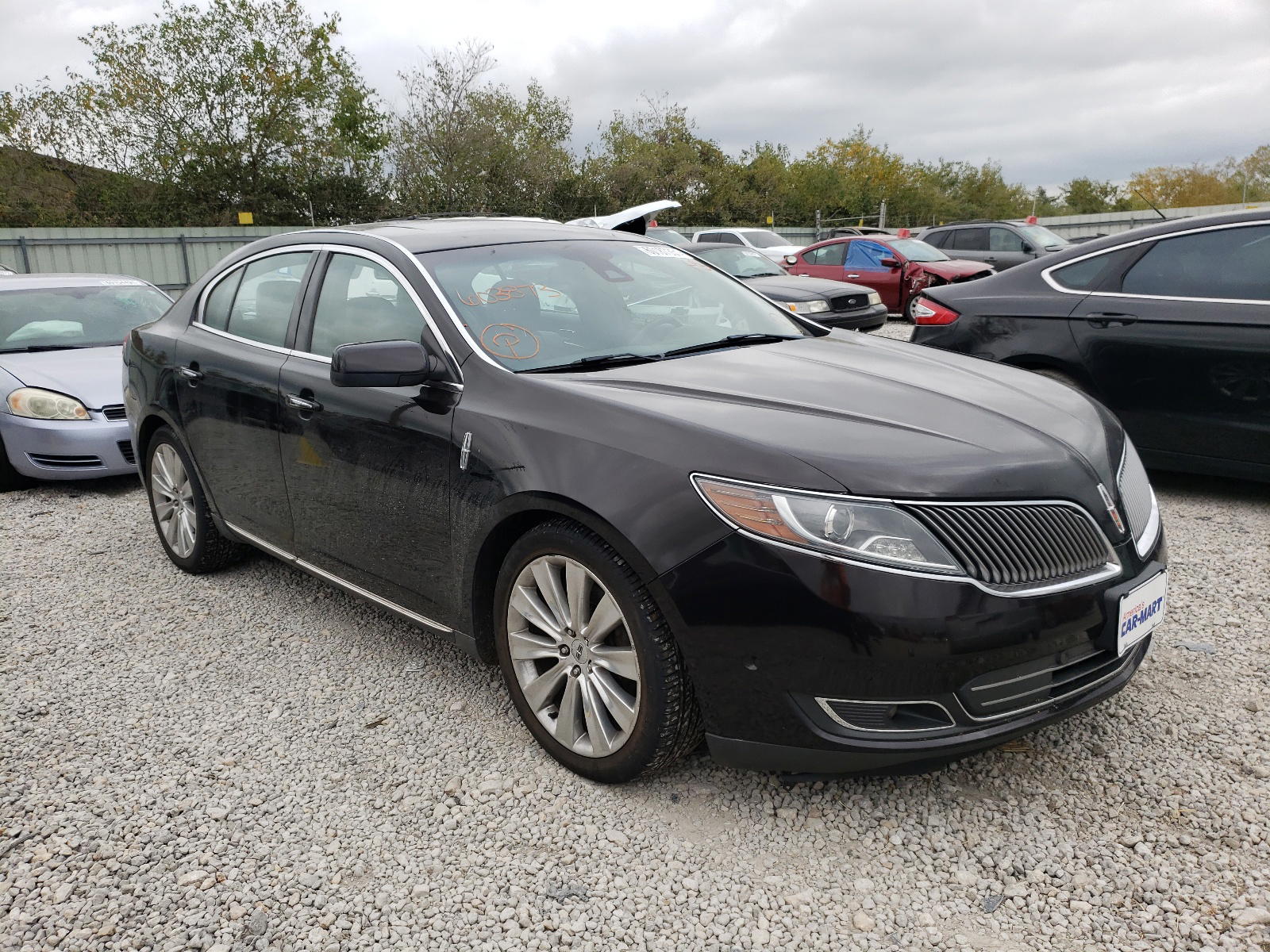 LINCOLN MKS 2013 with VIN 1LNHL9FT3DG603873 - Photo from auction