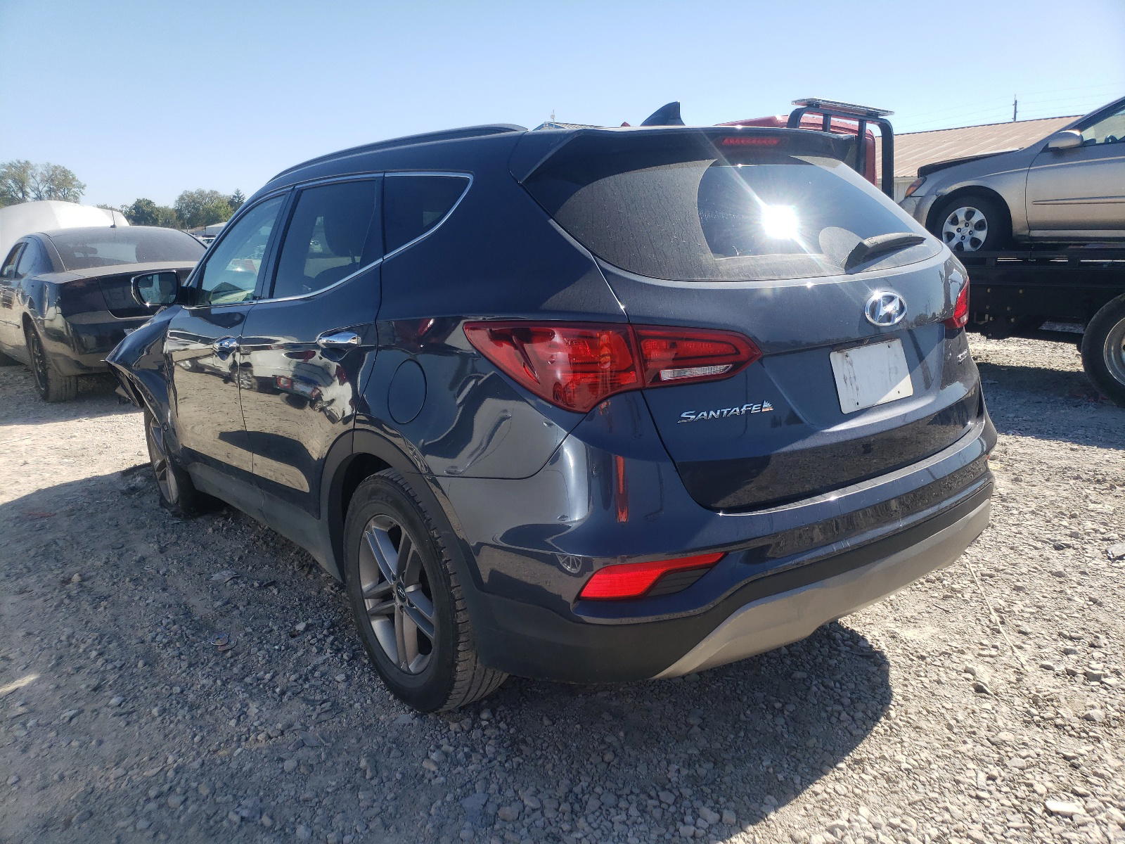 Photo 3 from auction – 2017 HYUNDAI SANTA FE S with VIN 5NMZU3LB2HH049917
